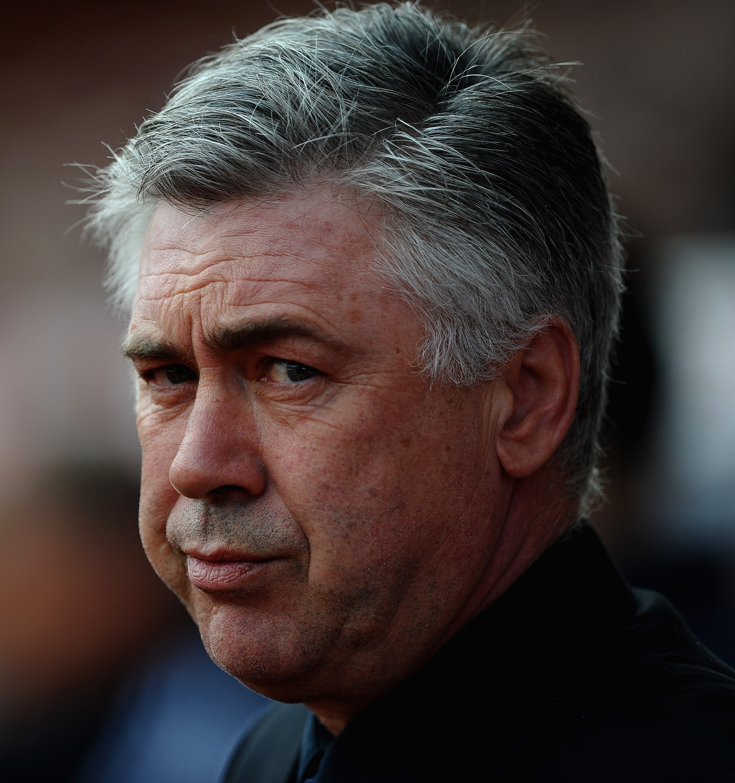 STOKE ON TRENT, ENGLAND - APRIL 02: Carlo Ancelotti of Chelsea looks on during the Barclays Premier League match between Stoke City and Chelsea at Britannia Stadium on April 2, 2011 in Stoke on Trent, England.  (Photo by Laurence Griffiths/Getty Images)