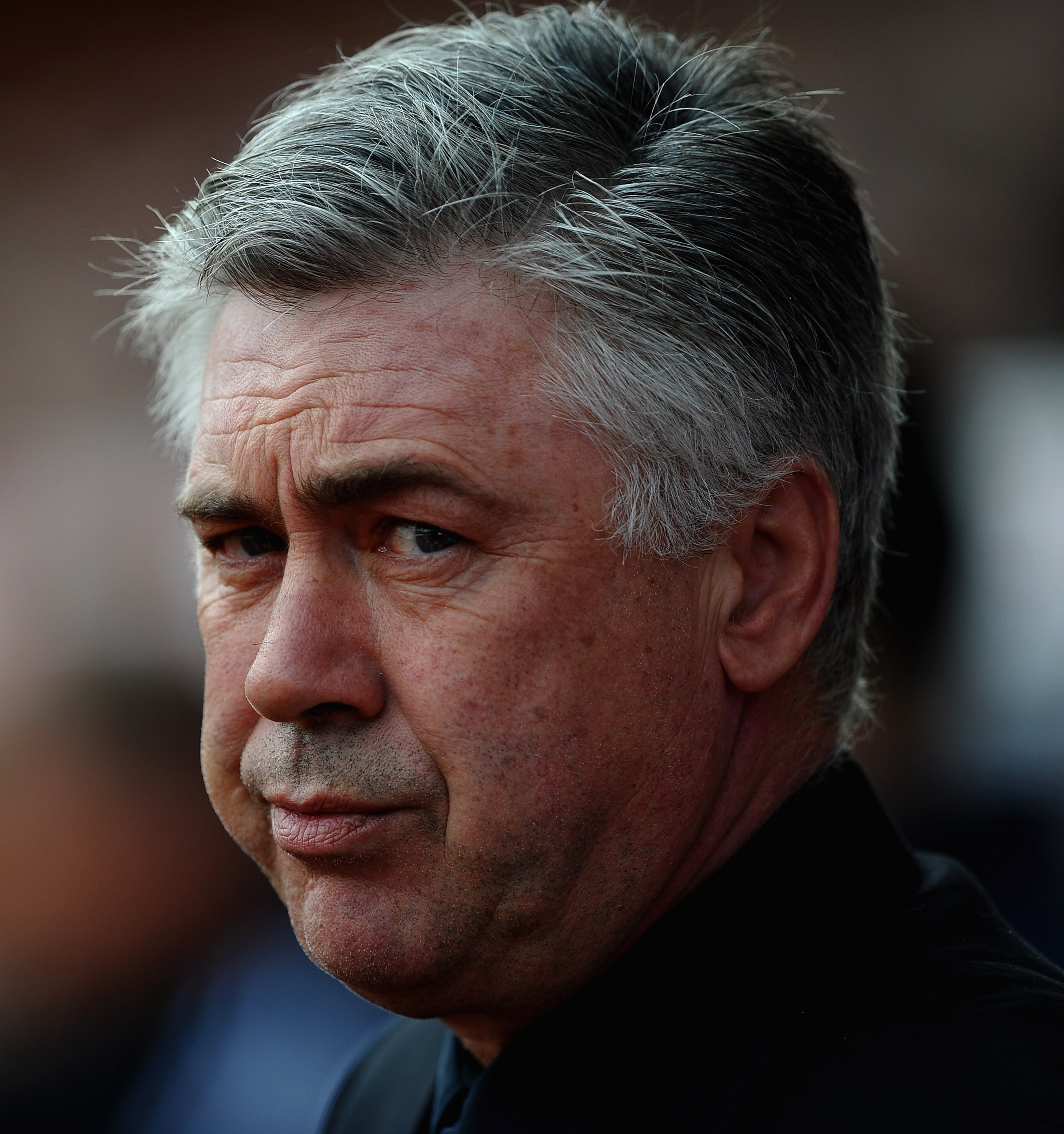 STOKE ON TRENT, ENGLAND - APRIL 02: Carlo Ancelotti of Chelsea looks on during the Barclays Premier League match between Stoke City and Chelsea at Britannia Stadium on April 2, 2011 in Stoke on Trent, England.  (Photo by Laurence Griffiths/Getty Images)