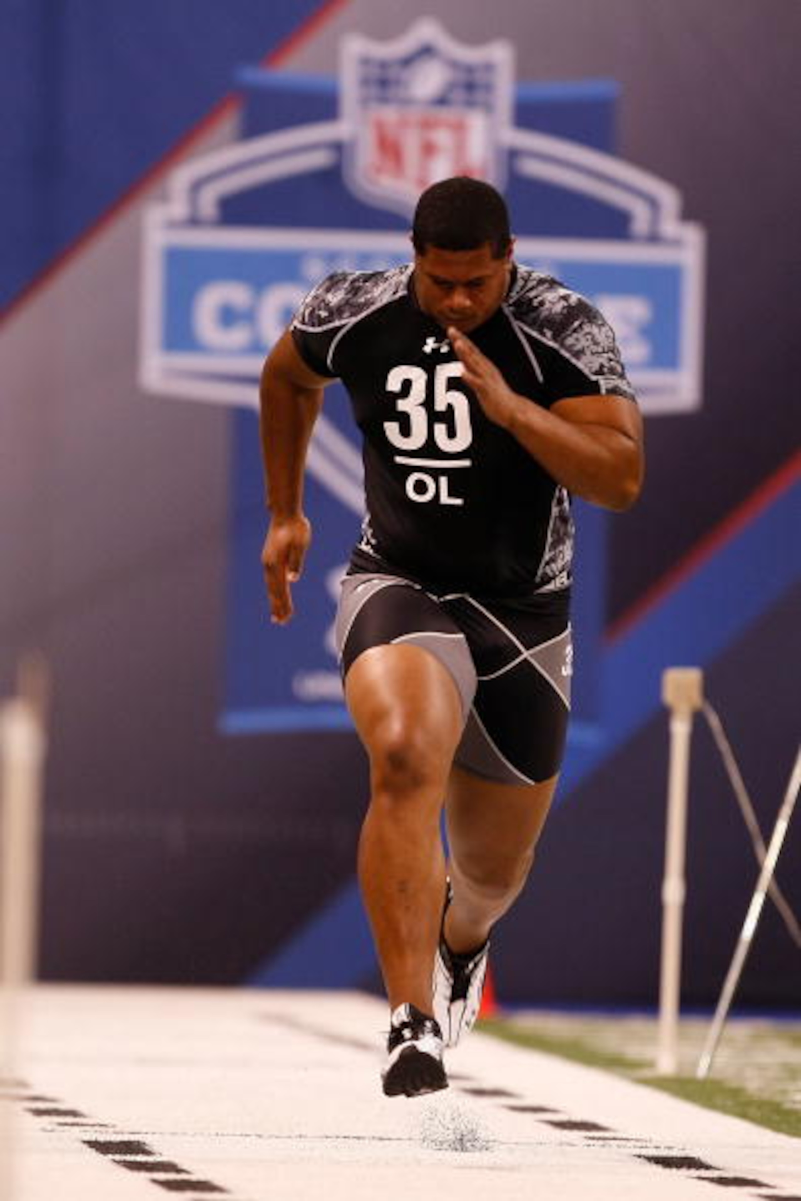 INDIANAPOLIS, IN - FEBRUARY 27: Offensive lineman Roger Saffold of Indiana runs the 40 yard dash during the NFL Scouting Combine presented by Under Armour at Lucas Oil Stadium on February 27, 2010 in Indianapolis, Indiana. (Photo by Scott Boehm/Getty Imag
