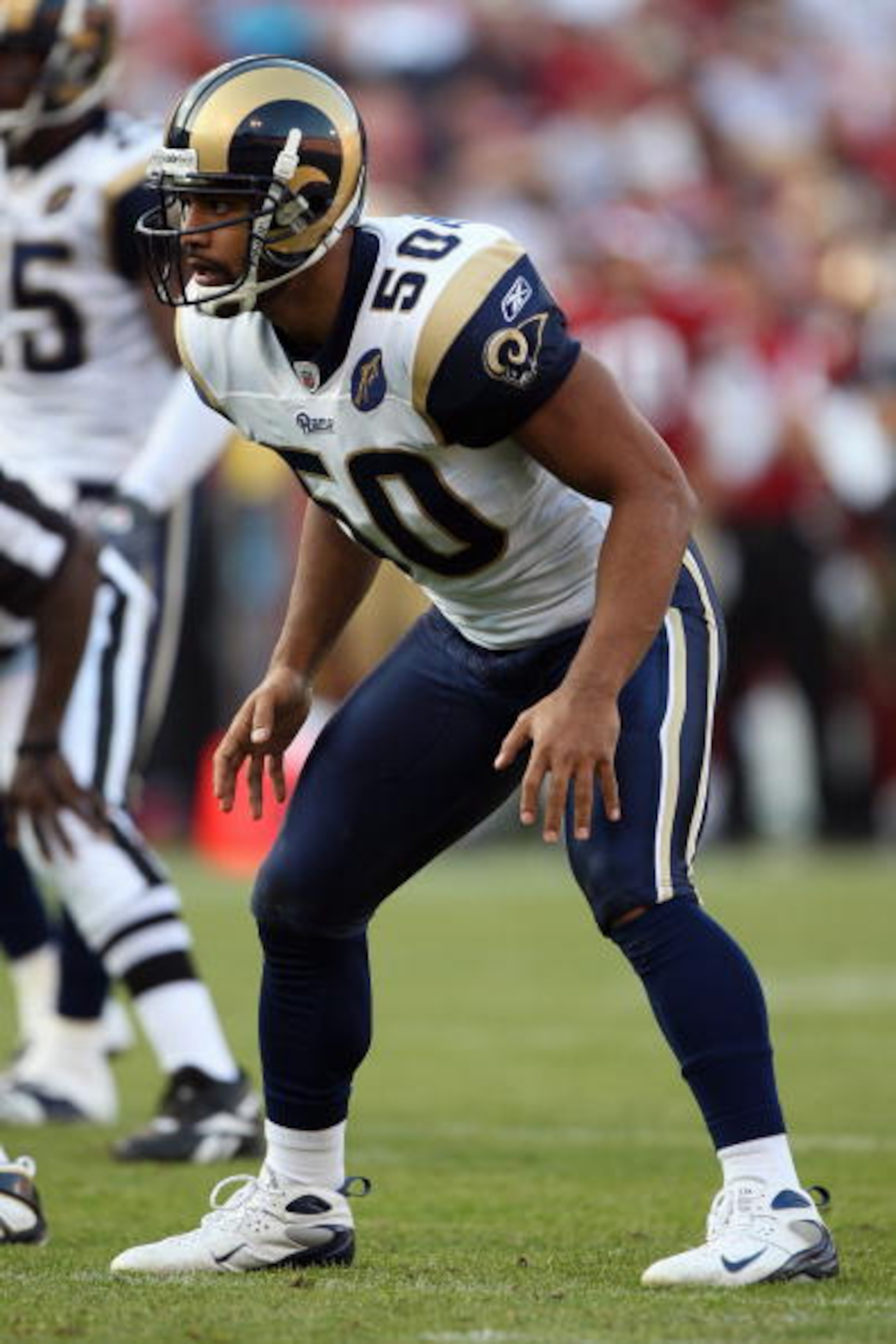 SAN FRANCISCO - NOVEMBER 16:  Pisa Tinoisamoa #50 of the St. Louis Rams sets during the game against the San Francisco 49ers on November 16, 2008 at Candlestick Park in San Francisco, California. (Photo by Jed Jacobsohn/Getty Images)