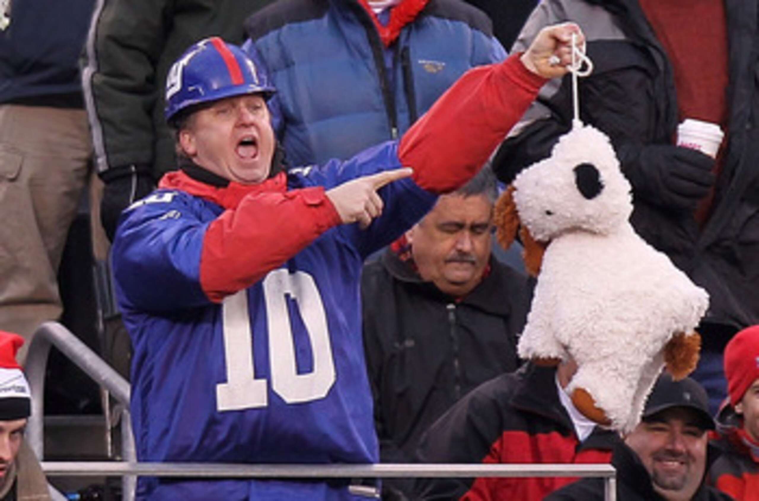EAST RUTHERFORD, NJ - DECEMBER 19: A fan of the New York Giants holds up a stuffed dog in a noose during the game against the Philadelphia Eagles at New Meadowlands Stadium on December 19, 2010 in East Rutherford, New Jersey.  (Photo by Nick Laham/Getty I