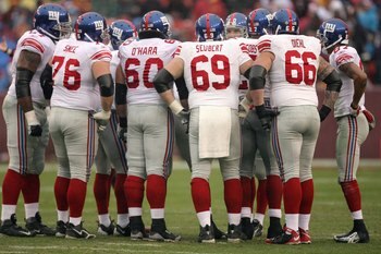 LANDOVER, MD - NOVEMBER 30: Shaun O'Hara #60, Rich Seubert #69 and David Diehl #66 of the New York Giants huddle on the field against the Washington Redskins during their game at FedEx Field on November 30, 2008 in Landover, Maryland. (Photo by Streeter LANDOVER, MD - NOVEMBER 30: Shaun O'Hara #60, Rich Seubert #69 and David Diehl #66 of the New York Giants huddle on the field against the Washington Redskins during their game at FedEx Field on November 30, 2008 in Landover, Maryland. (Photo by Streeter