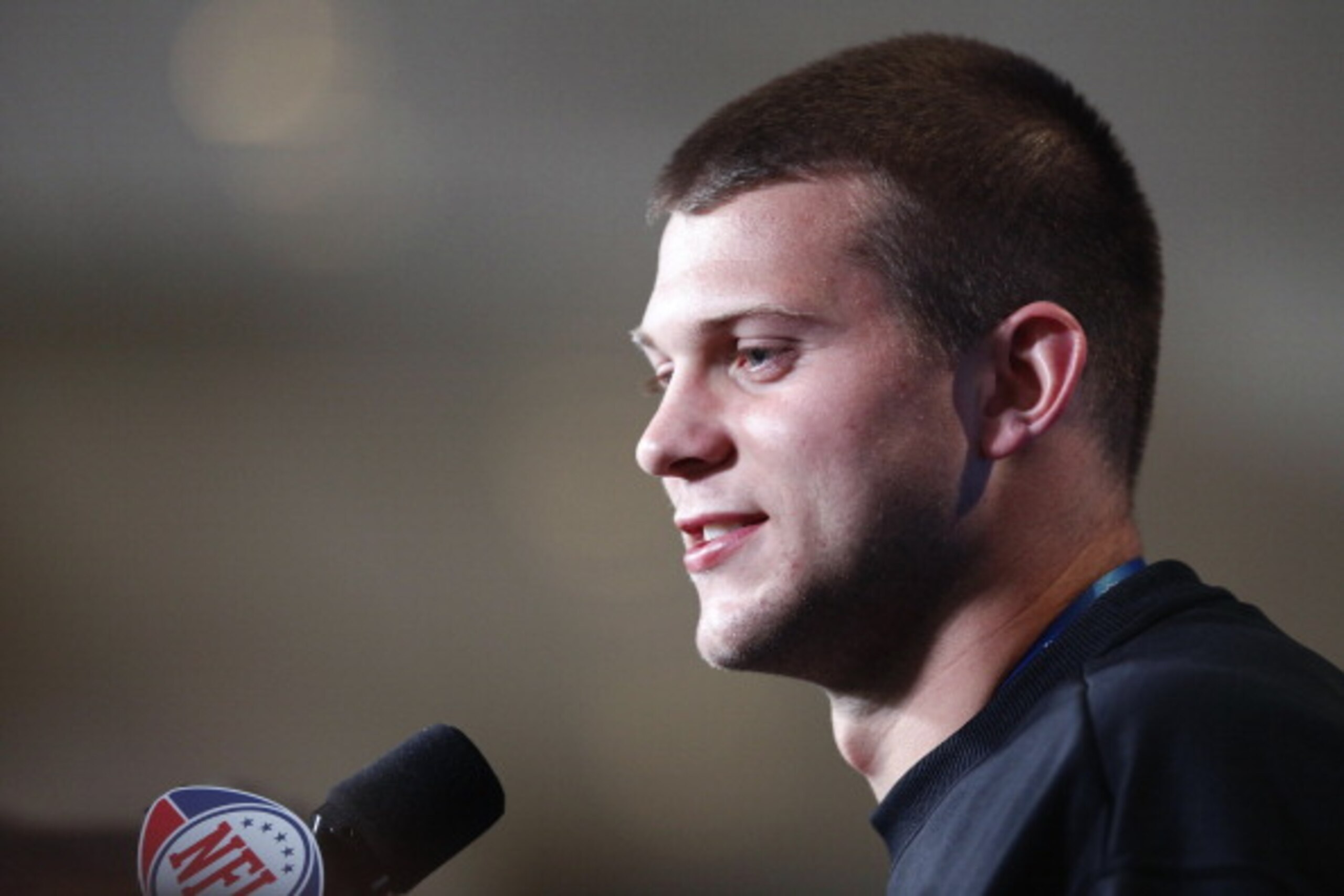 INDIANAPOLIS, IN - FEBRUARY 25: Washington Huskies quarterback Jake Locker answers questions during a media session at the 2011 NFL Scouting Combine at Lucas Oil Stadium on February 25, 2011 in Indianapolis, Indiana. (Photo by Joe Robbins/Getty Images)