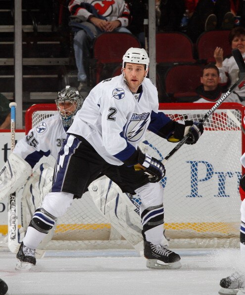 NEWARK, NJ - MARCH 02:  Eric Brewer #2 of the Tampa Bay Lightning helps defend the net during an NHL hockey game against the New Jersey Devils at the Prudential Center on March 2, 2011 in Newark, New Jersey.  (Photo by Paul Bereswill/Getty Images)