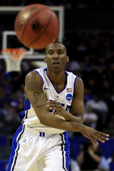 CHARLOTTE, NC - MARCH 18:  Nolan Smith #2 of the Duke Blue Devils passes the ball in the second half while taking on the Hampton Pirates during the second round of the 2011 NCAA men's basketball tournament at Time Warner Cable Arena on March 18, 2011 in C