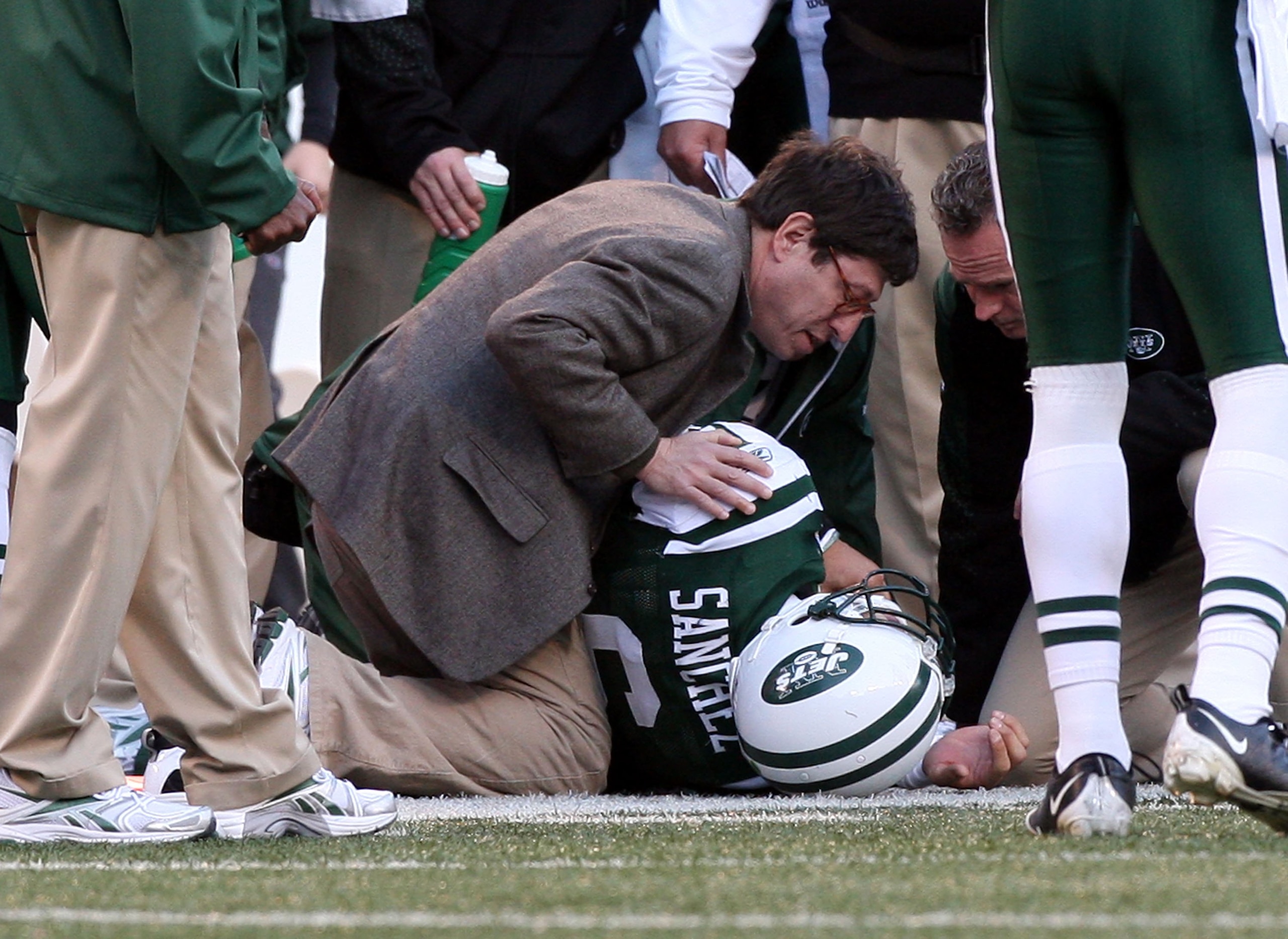 EAST RUTHERFORD, NJ - NOVEMBER 29: Mark Sanchez #6 of the New York Jets is tended too after an injury against the Carolina Panthers on November 29, 2009 at Giants Stadium in East Rutherford, New Jersey. (Photo by Jim McIsaac/Getty Images) EAST RUTHERFORD, NJ - NOVEMBER 29: Mark Sanchez #6 of the New York Jets is tended too after an injury against the Carolina Panthers on November 29, 2009 at Giants Stadium in East Rutherford, New Jersey. (Photo by Jim McIsaac/Getty Images)