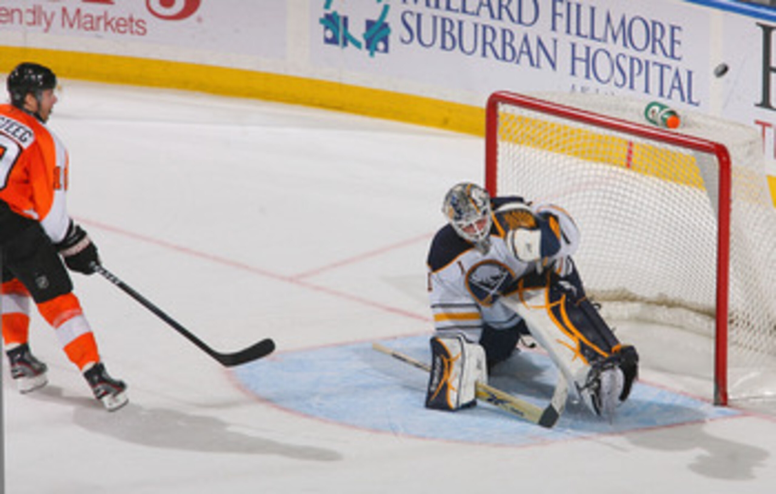 BUFFALO, NY - APRIL 08: Jhonas Enroth #1 of the Buffalo Sabres deflects a shot by Kris Versteeg #10 of the Philadelphia Flyers at HSBC Arena on April 8, 2011 in Buffalo, New York.  (Photo by Rick Stewart/Getty Images)