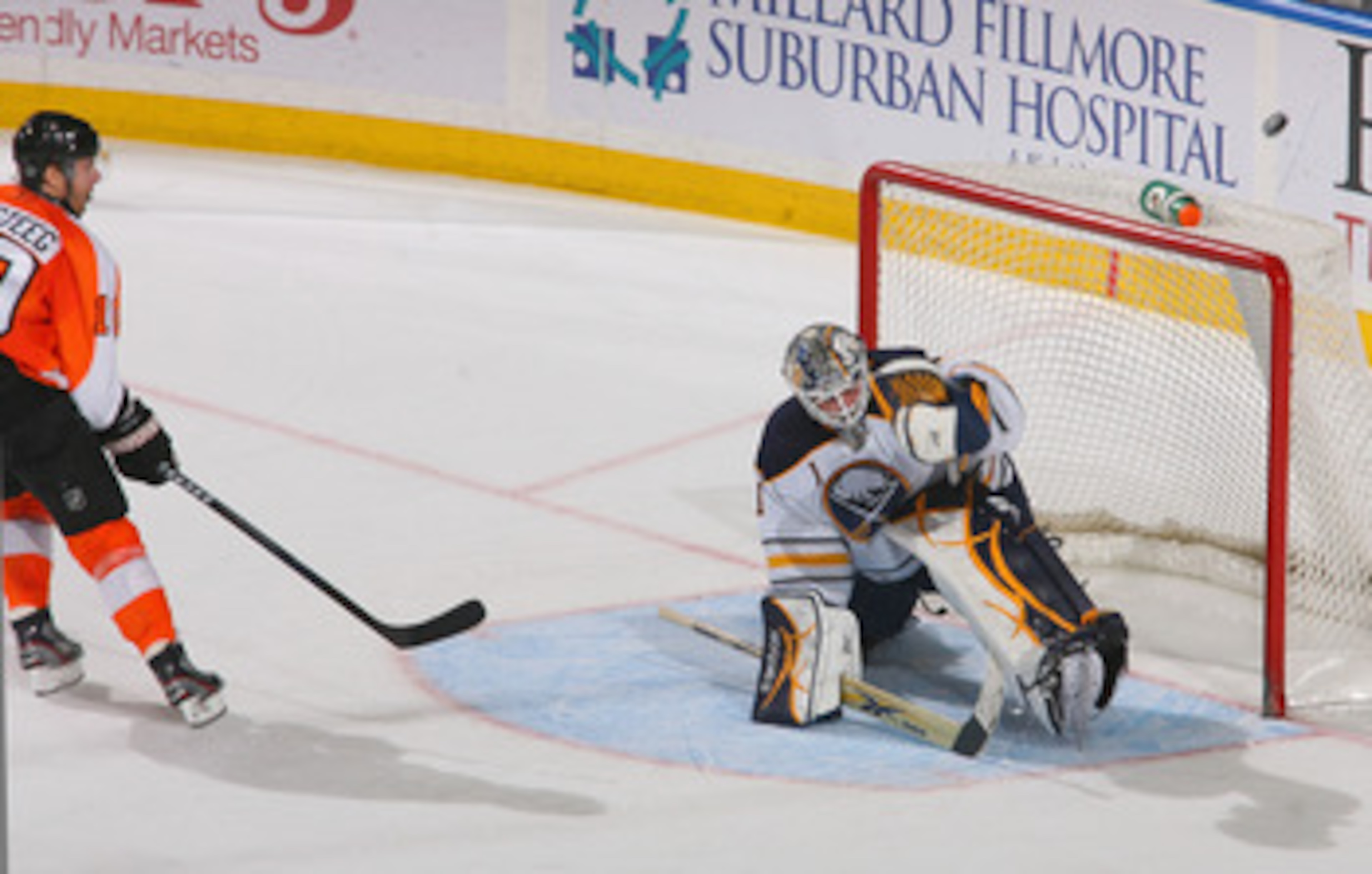 BUFFALO, NY - APRIL 08: Jhonas Enroth #1 of the Buffalo Sabres deflects a shot by Kris Versteeg #10 of the Philadelphia Flyers at HSBC Arena on April 8, 2011 in Buffalo, New York. (Photo by Rick Stewart/Getty Images) BUFFALO, NY - APRIL 08: Jhonas Enroth #1 of the Buffalo Sabres deflects a shot by Kris Versteeg #10 of the Philadelphia Flyers at HSBC Arena on April 8, 2011 in Buffalo, New York. (Photo by Rick Stewart/Getty Images)