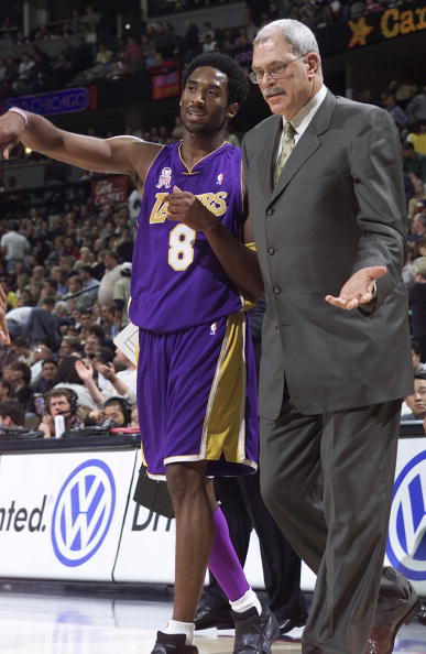 21 Nov 2001:   Guard Kobe Bryant #8 and head coach Phil Jackson discuss the play preceding the end of the first half against the Denver Nuggets at the Pepsi Center in Denver, Colorado.    DIGITAL IMAGE    NOTE TO USER:  User expressly acknowledges and agr