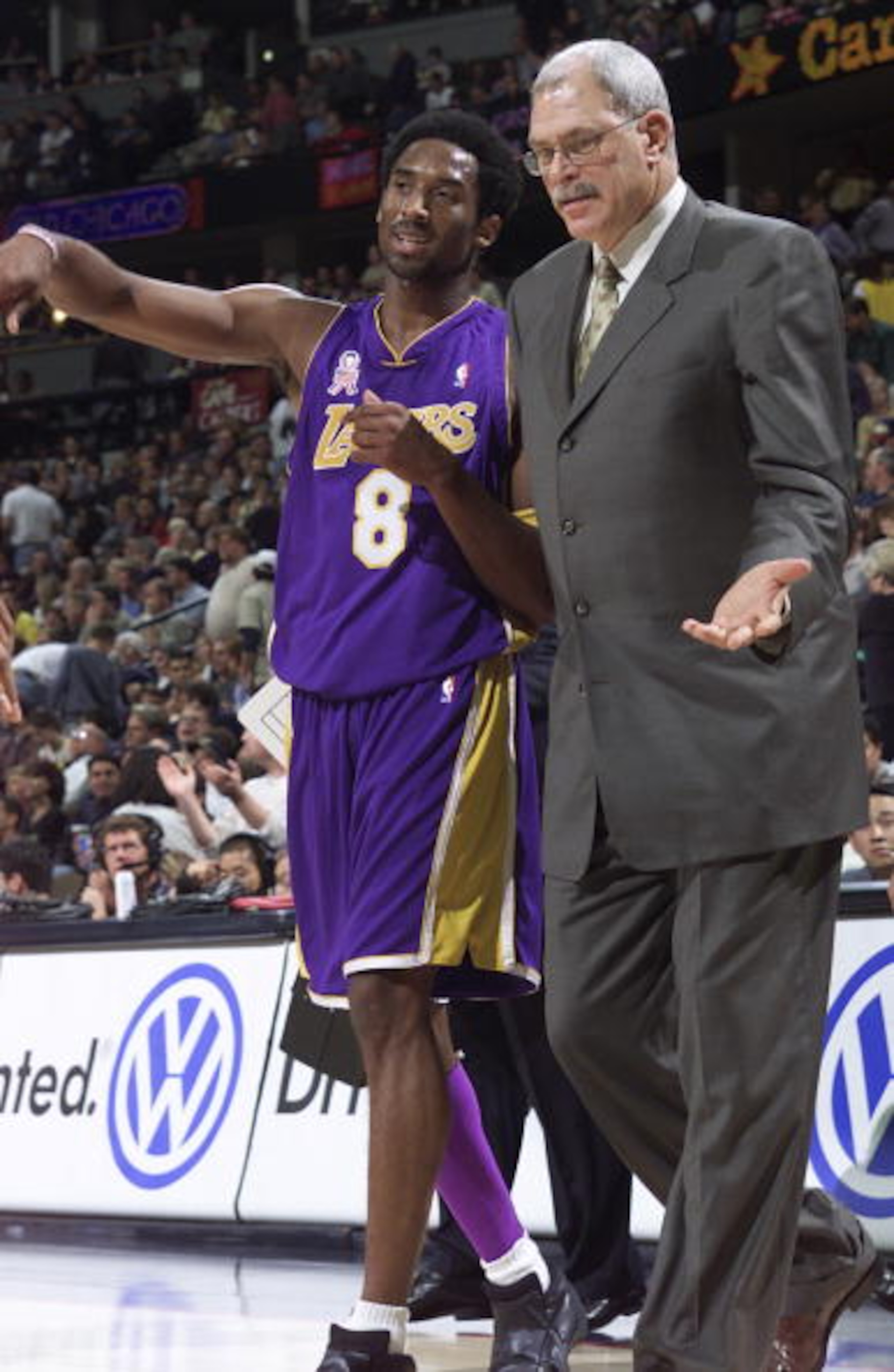 21 Nov 2001:   Guard Kobe Bryant #8 and head coach Phil Jackson discuss the play preceding the end of the first half against the Denver Nuggets at the Pepsi Center in Denver, Colorado.    DIGITAL IMAGE    NOTE TO USER:  User expressly acknowledges and agr