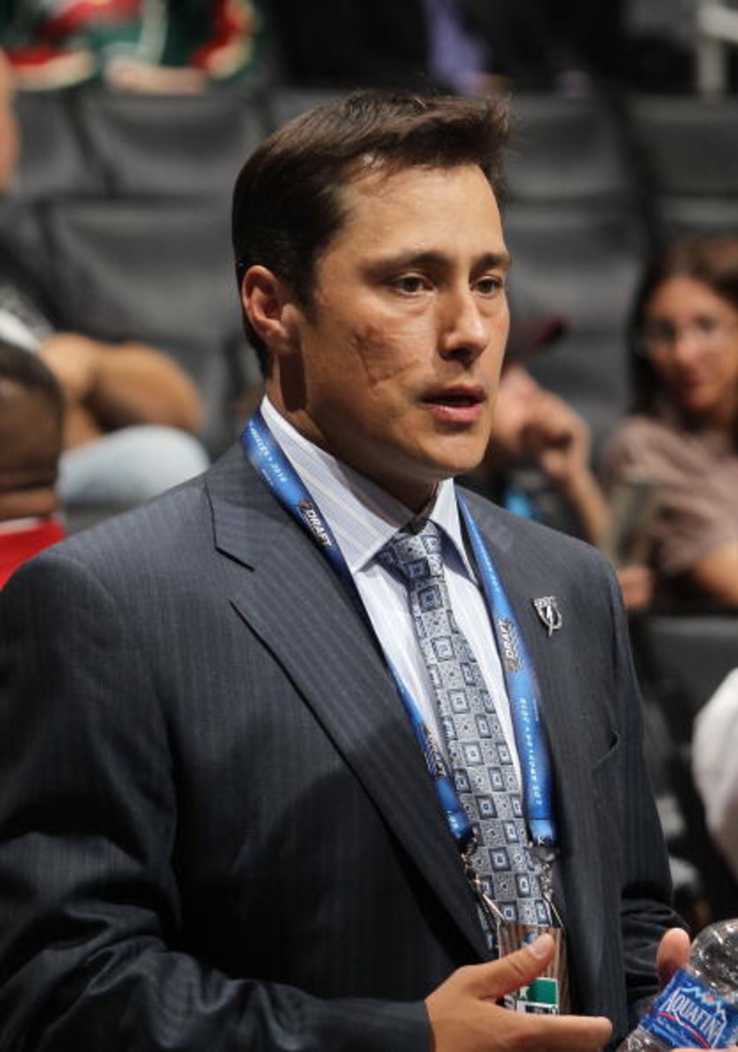 LOS ANGELES, CA - JUNE 25:  Head coach Guy Boucher of the Tampa Bay Lightning works on the draft floor during the 2010 NHL Entry Draft at Staples Center on June 25, 2010 in Los Angeles, California.  (Photo by Bruce Bennett/Getty Images)