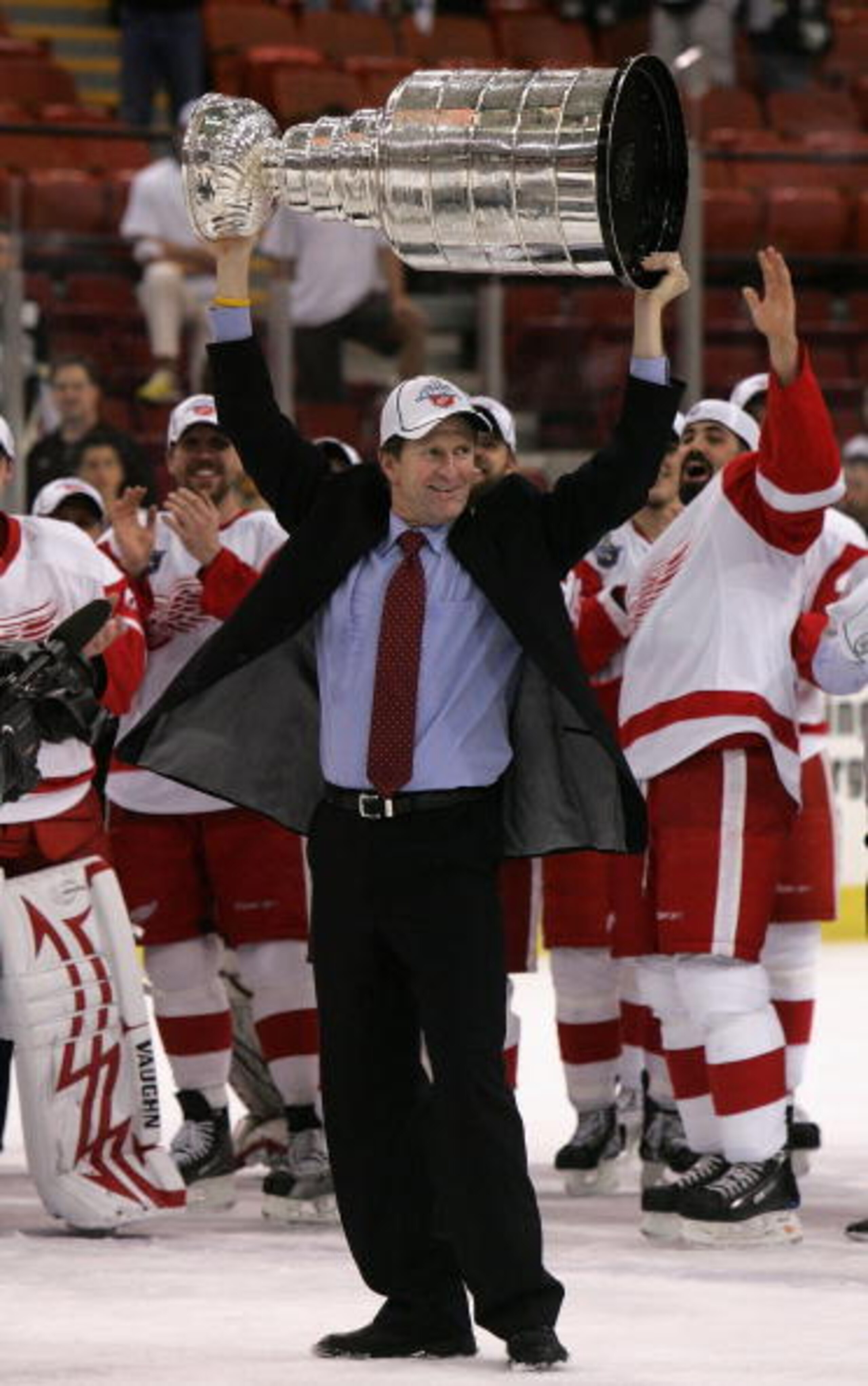 PITTSBURGH - JUNE 04:  Head coach Mike Babcock of the Detroit Red Wings celebrates with the Stanley Cup after defeating the Pittsburgh Penguins in game six of the 2008 NHL Stanley Cup Finals at Mellon Arena on June 4, 2008 in Pittsburgh. Pennsylvania. The