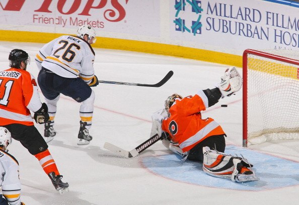 BUFFALO, NY - APRIL 08: Thomas Vanek #26 of the Buffalo Sabres gets the puck behind Sergei Bobrovsky #35 of the Philadelphia Flyers for the game winning goal in overtime at HSBC Arena on April 8, 2011 in Buffalo, New York. Buffalo won 4-3 in overtime. (Ph