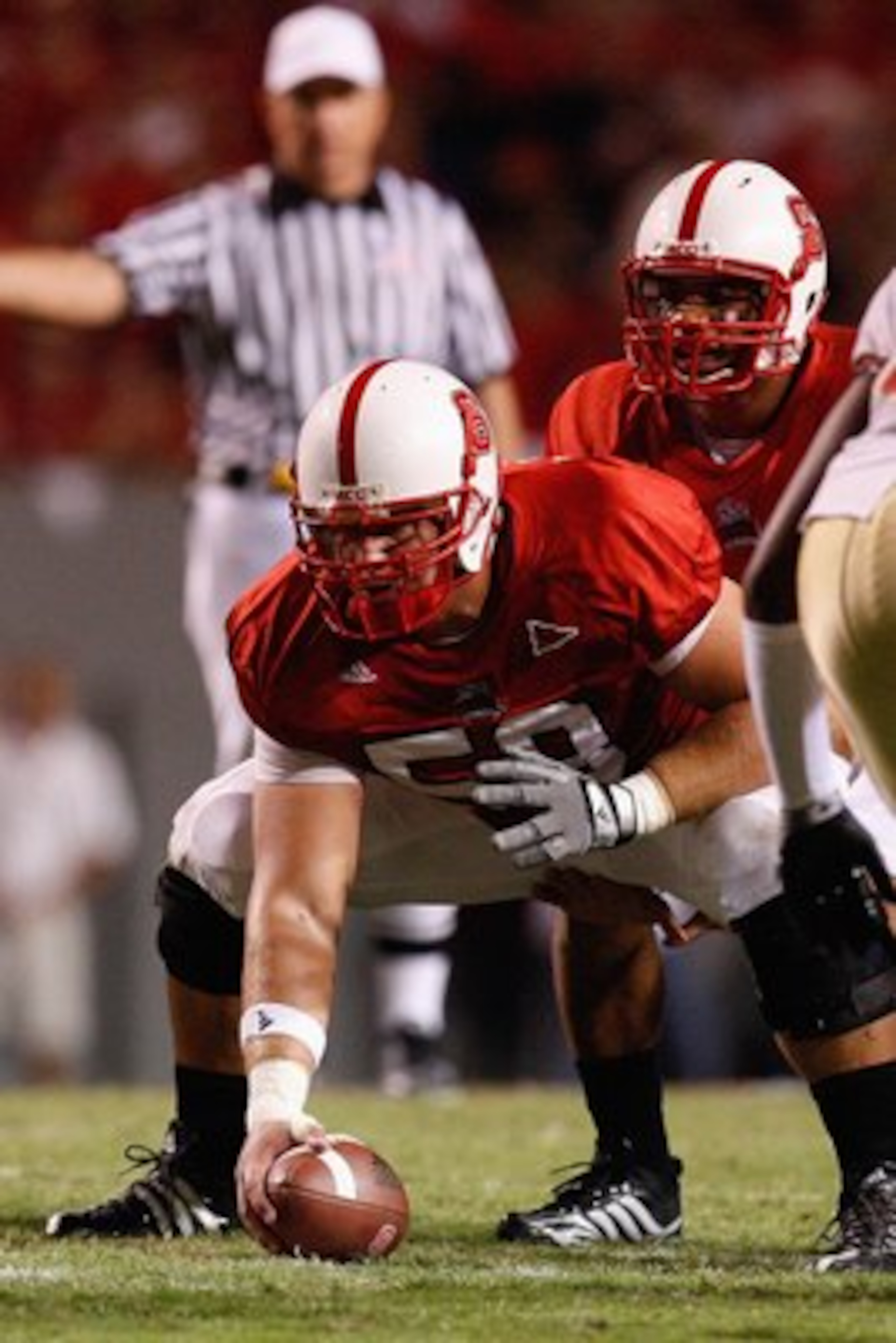 RALEIGH, NC - OCTOBER 16:  Ted Larsen #58 of the North Carolina State Wolfpack prepares to snap the ball to Russell Wilson #16 during the game against the Florida State Seminoles at Carter-Finley Stadium on October 16, 2008 in Raleigh, North Carolina.  (P