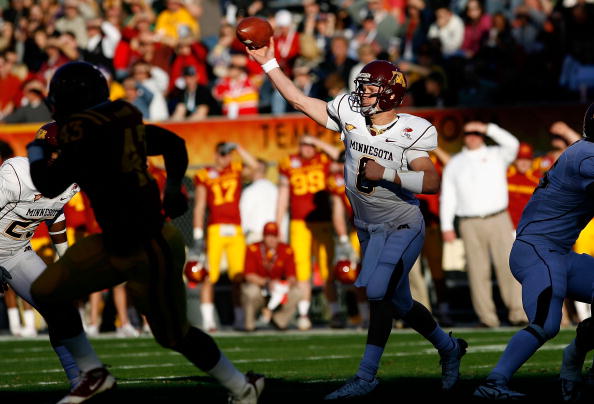 TEMPE, AZ - DECEMBER 31:  Quarterback Adam Weber #8 of the Minnesota Golden Gophers throws a pass during the first quarter of the Insight Bowl at Arizona Stadium on December 31, 2009 in Tempe, Arizona.  (Photo by Christian Petersen/Getty Images)