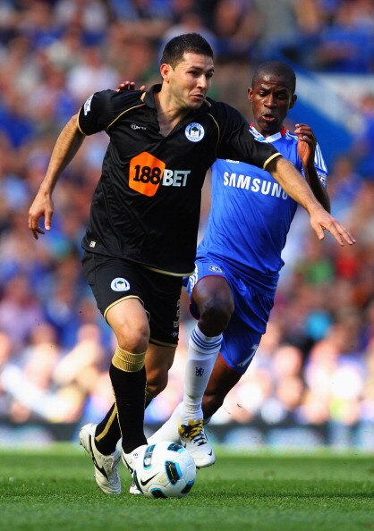 LONDON, ENGLAND - APRIL 09:  Ramires of Chelsea chases Antolin Alcaraz of Wigan Athletic during the Barclays Premier League match between Chelsea and Wigan Athletic at Stamford Bridge on April 9, 2011 in London, England.  (Photo by Clive Rose/Getty Images