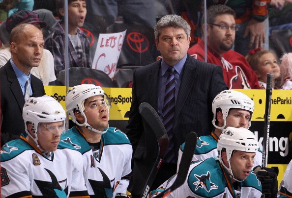GLENDALE, AZ - JANUARY 17:  Head coach Todd McLellan of the San Jose Sharks watches from the bench during the NHL game against the Phoenix Coyotes at Jobing.com Arena on January 17, 2011 in Glendale, Arizona.  The Sharks defeated the Coyotes 4-2.  (Photo