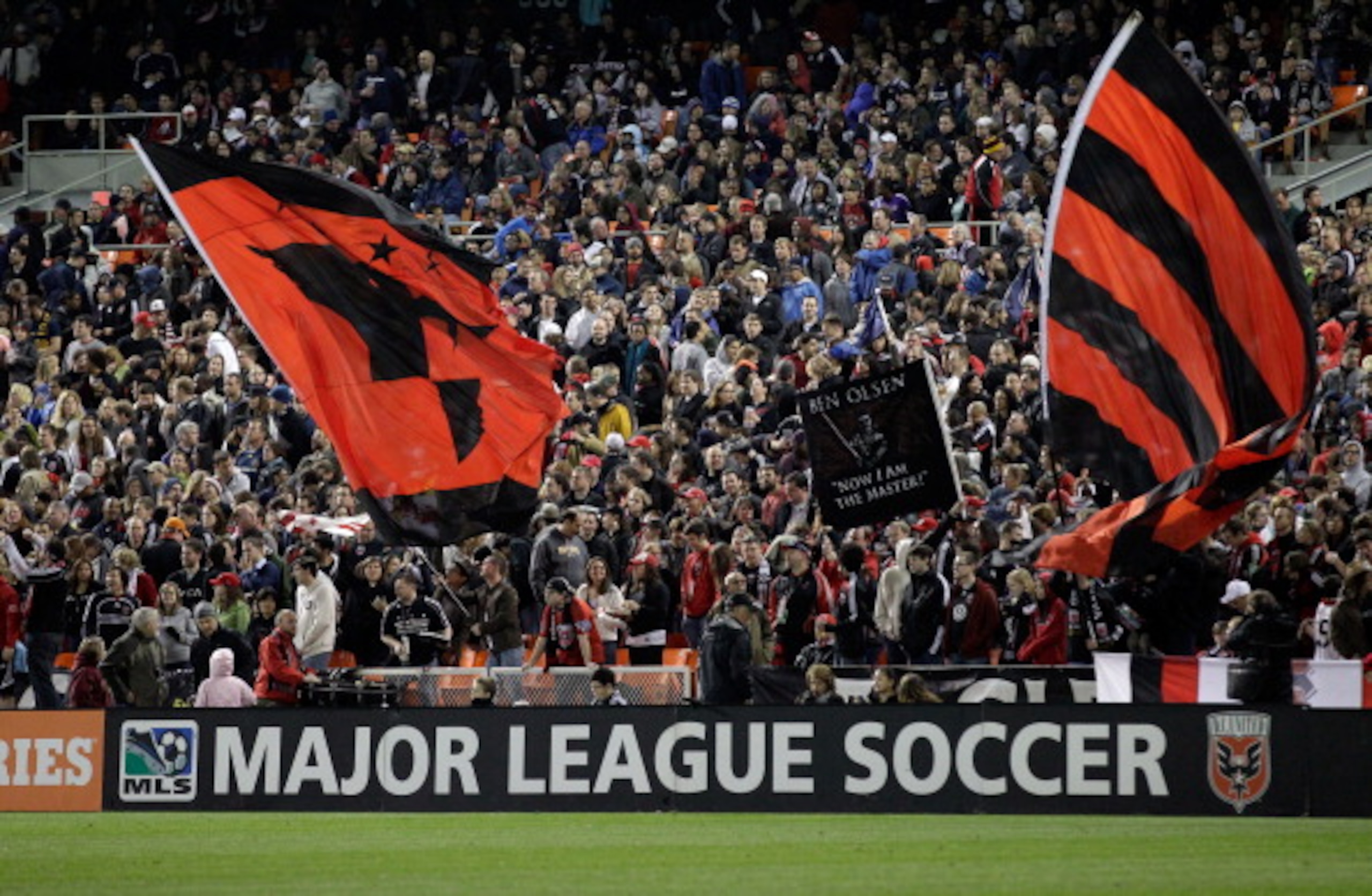 WASHINGTON, DC - APRIL 09: Fans waves flags  during the second half between the D.C. United and the Los Angeles Galaxy at RFK Stadium on April 9, 2011 in Washington, DC. The game ended in a 1-1  draw. (Photo by Rob Carr/Getty Images)