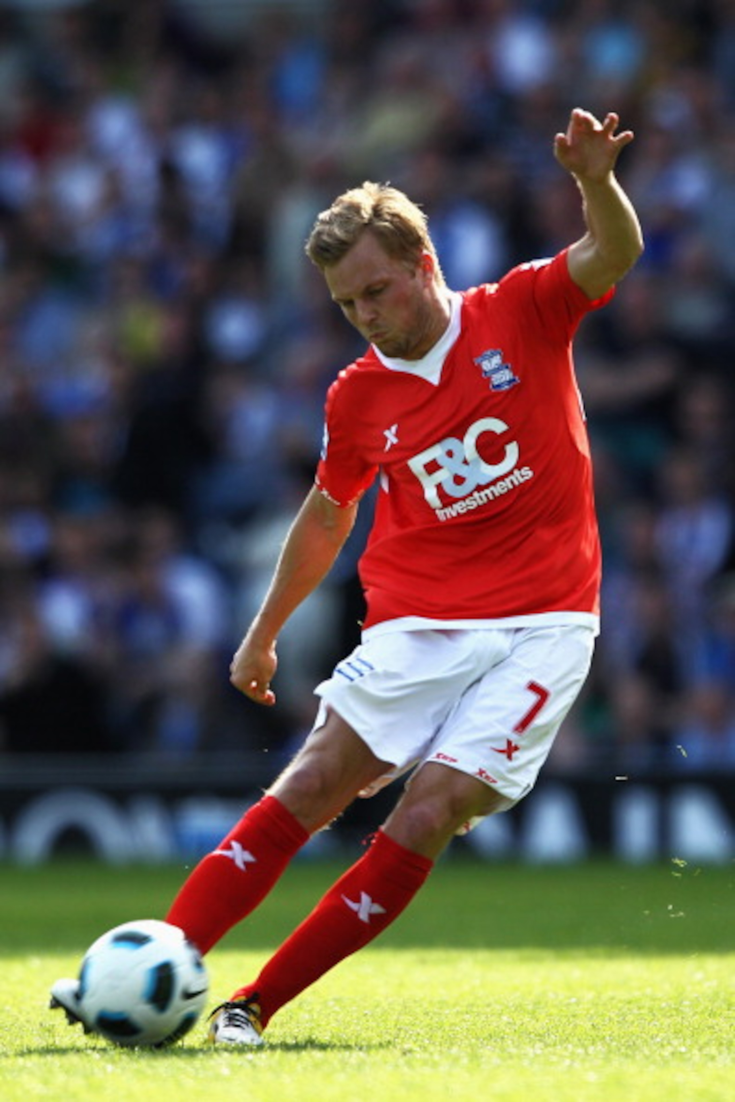 BLACKBURN, ENGLAND - APRIL 09:  Sebastian Larsson of Birmingham City takes a free kick during the Barclays Premier League match between Blackburn Rovers and Birmingham City at Ewood park on April 9, 2011 in Blackburn, England.  (Photo by Dean Mouhtaropoul