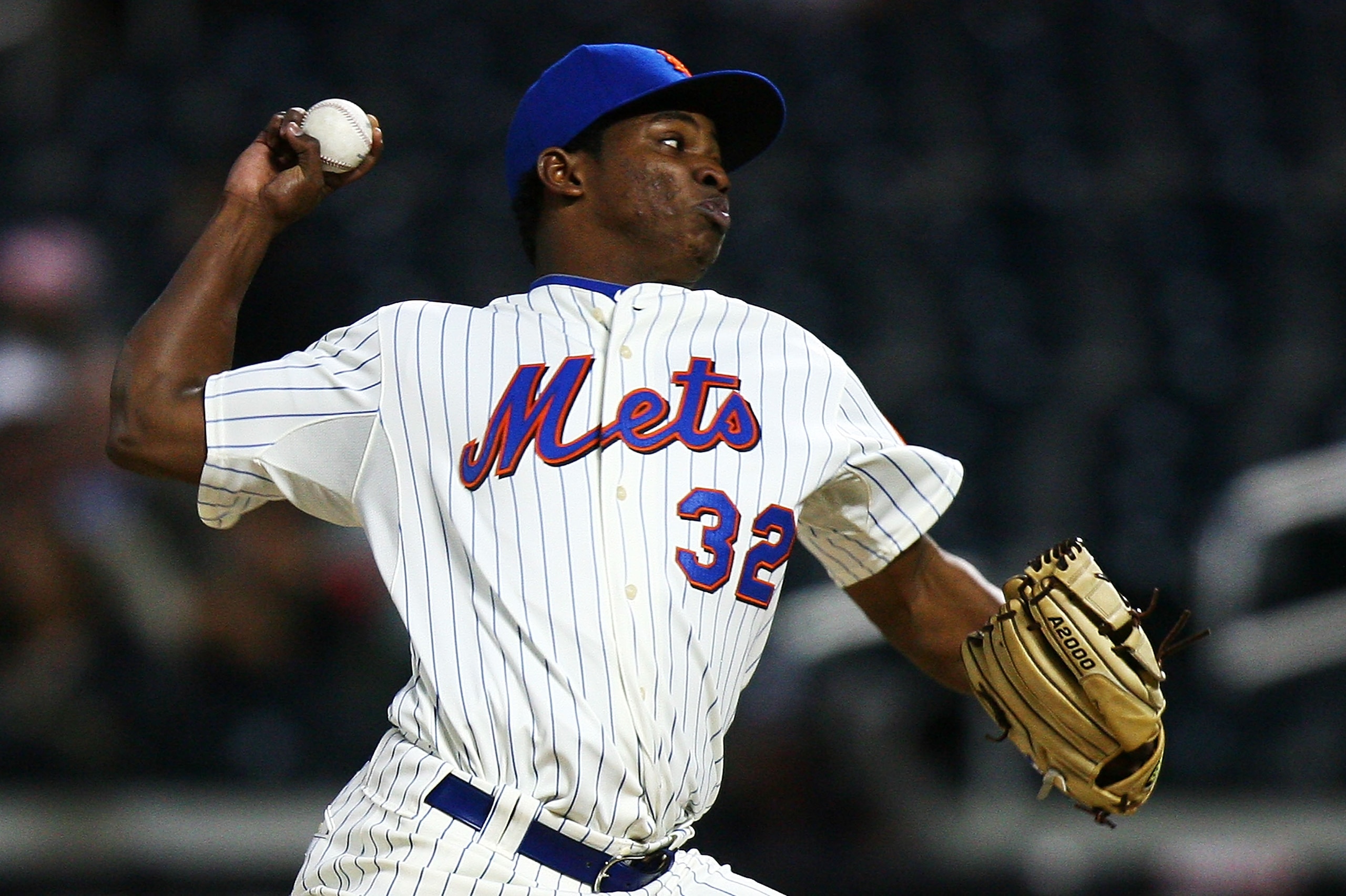 NEW YORK - SEPTEMBER 15:  Jenrry Mejia #32 of the New York Mets pitches against the Pittsburgh Pirates on September 15, 2010 at Citi Field in the Flushing neighborhood of the Queens borough of New York City.  (Photo by Andrew Burton/Getty Images)