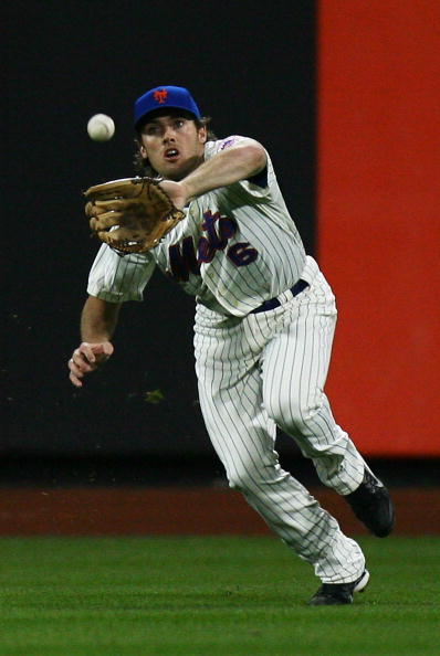 NEW YORK - SEPTEMBER 15:  Nick Evans #6 of the New York Mets fields a ball against the Pittsburgh Pirates on September 15, 2010 at Citi Field in the Flushing neighborhood of the Queens borough of New York City.  (Photo by Andrew Burton/Getty Images)