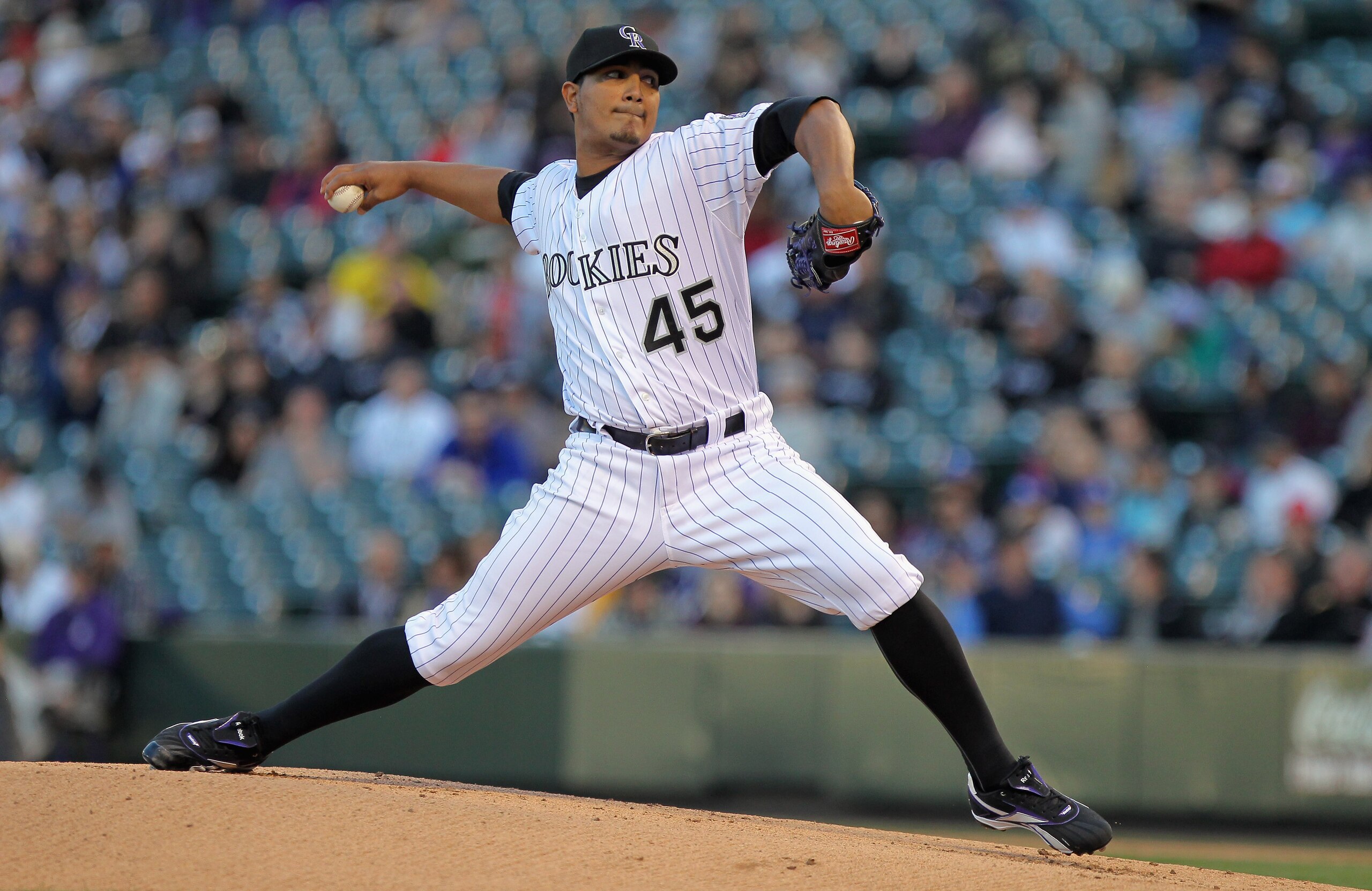 DENVER, CO - APRIL 05: Starting pitcher Jhoulys Chacin #45 of the Colorado Rockies delivers against the Los Angeles Dodgers at Coors Field on April 5, 2011 in Denver, Colorado. (Photo by Doug Pensinger/Getty Images) DENVER, CO - APRIL 05: Starting pitcher Jhoulys Chacin #45 of the Colorado Rockies delivers against the Los Angeles Dodgers at Coors Field on April 5, 2011 in Denver, Colorado. (Photo by Doug Pensinger/Getty Images)