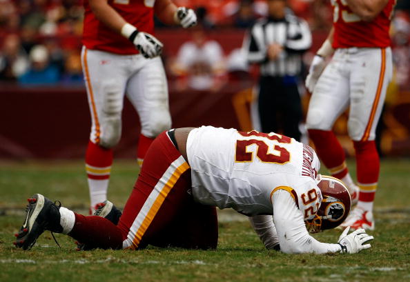 LANDOVER, MD - OCTOBER 18:  Albert Haynesworth #92 the Washington Redskins struggles to get off the field against the Kansas City Chiefs during their game October 18, 2009 at FedEx Field in Landover, Maryland. The Chiefs won the game 14-6.  (Photo by Win