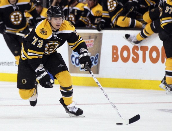 BOSTON, MA - MARCH 24:  Michael Ryder #73 of the Boston Bruins takes the Montreal Canadiens on March 24, 2011 at the TD Garden in Boston, Massachusetts.  (Photo by Elsa/Getty Images)
