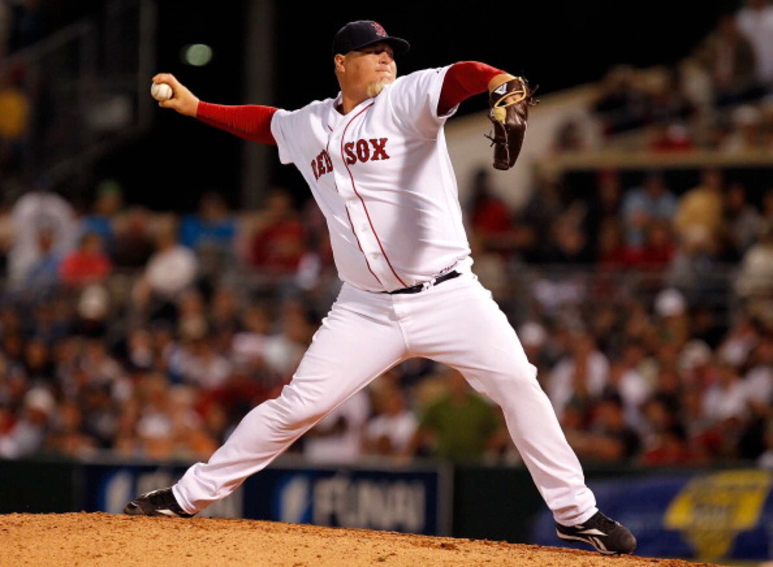 FORT MYERS, FL - MARCH 14: Pitcher Bobby Jenks #52 of the Boston Red Sox pitches against the New York Yankees during a Grapefruit League Spring Training Game at City of Palms Park on March 14, 2011 in Fort Myers, Florida. (Photo by J. Meric/Getty Images FORT MYERS, FL - MARCH 14: Pitcher Bobby Jenks #52 of the Boston Red Sox pitches against the New York Yankees during a Grapefruit League Spring Training Game at City of Palms Park on March 14, 2011 in Fort Myers, Florida. (Photo by J. Meric/Getty Images
