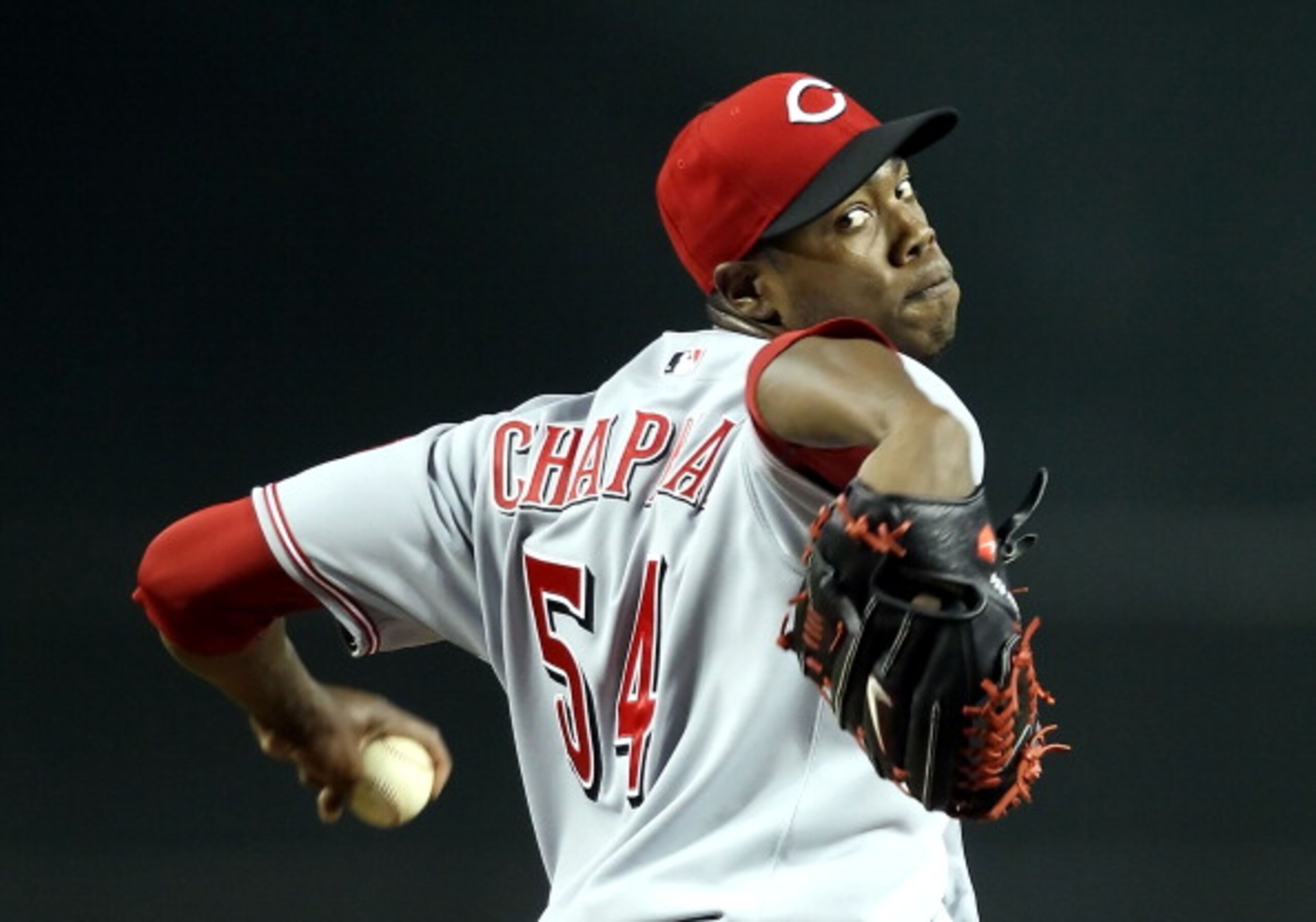 PHOENIX, AZ - APRIL 09: Relief pitcher Aroldis Chapman #54 of the Cincinnati Reds pitches against the Arizona Diamondbacks during the Major League Baseball game at Chase Field on April 9, 2011 in Phoenix, Arizona. (Photo by Christian Petersen/Getty Imag PHOENIX, AZ - APRIL 09: Relief pitcher Aroldis Chapman #54 of the Cincinnati Reds pitches against the Arizona Diamondbacks during the Major League Baseball game at Chase Field on April 9, 2011 in Phoenix, Arizona. (Photo by Christian Petersen/Getty Imag
