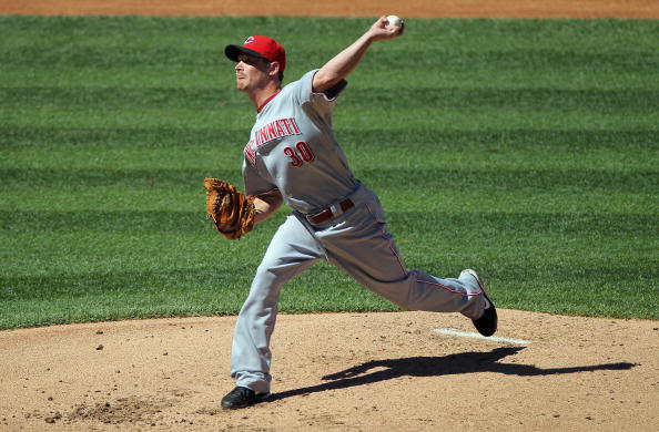 DENVER - SEPTEMBER 09:  Starting pitcher Travis Wood #30 the Cincinnati Reds delivers against the Colorado Rockie at Coors Field on September 9, 2010 in Denver, Colorado. Hammel pitches seven innings as the Rockies defeated the Reds 6-5.  (Photo by Doug P