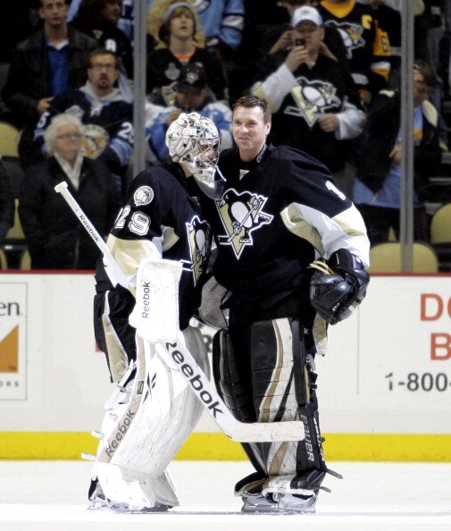 PITTSBURGH, PA - APRIL 05:  Brent Johnson #1 of the Pittsburgh Penguins congratulates Marc-Andre Fleury #29 for the win against the New Jersey Devils at Consol Energy Center on April 5, 2011 in Pittsburgh, Pennsylvania.  The Penguins defeated the Devils 4