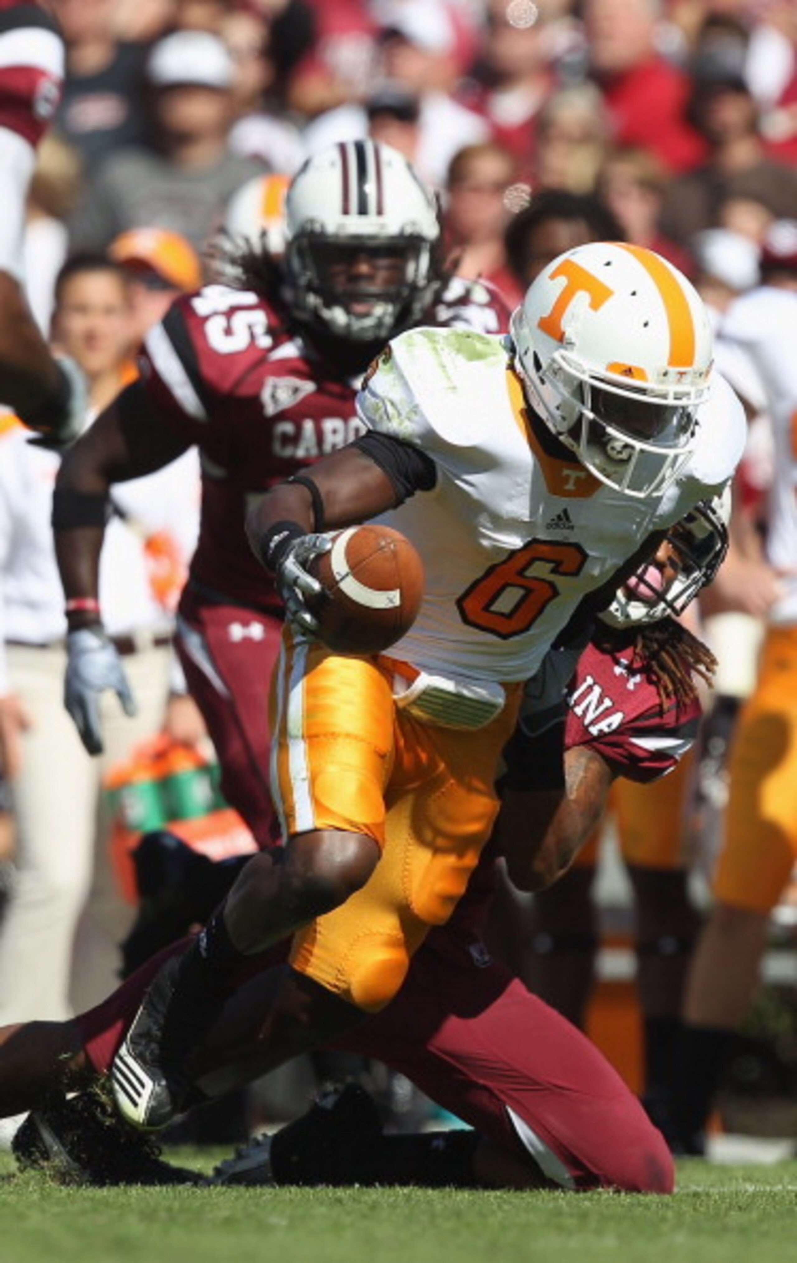 COLUMBIA, SC - OCTOBER 30: Denarius Moore #6 of the Tennessee Volunteers is tackled by Melvin Ingram #6 of the South Carolina Gamecocks during their game at Williams-Brice Stadium on October 30, 2010 in Columbia, South Carolina. (Photo by Streeter Lecka COLUMBIA, SC - OCTOBER 30: Denarius Moore #6 of the Tennessee Volunteers is tackled by Melvin Ingram #6 of the South Carolina Gamecocks during their game at Williams-Brice Stadium on October 30, 2010 in Columbia, South Carolina. (Photo by Streeter Lecka