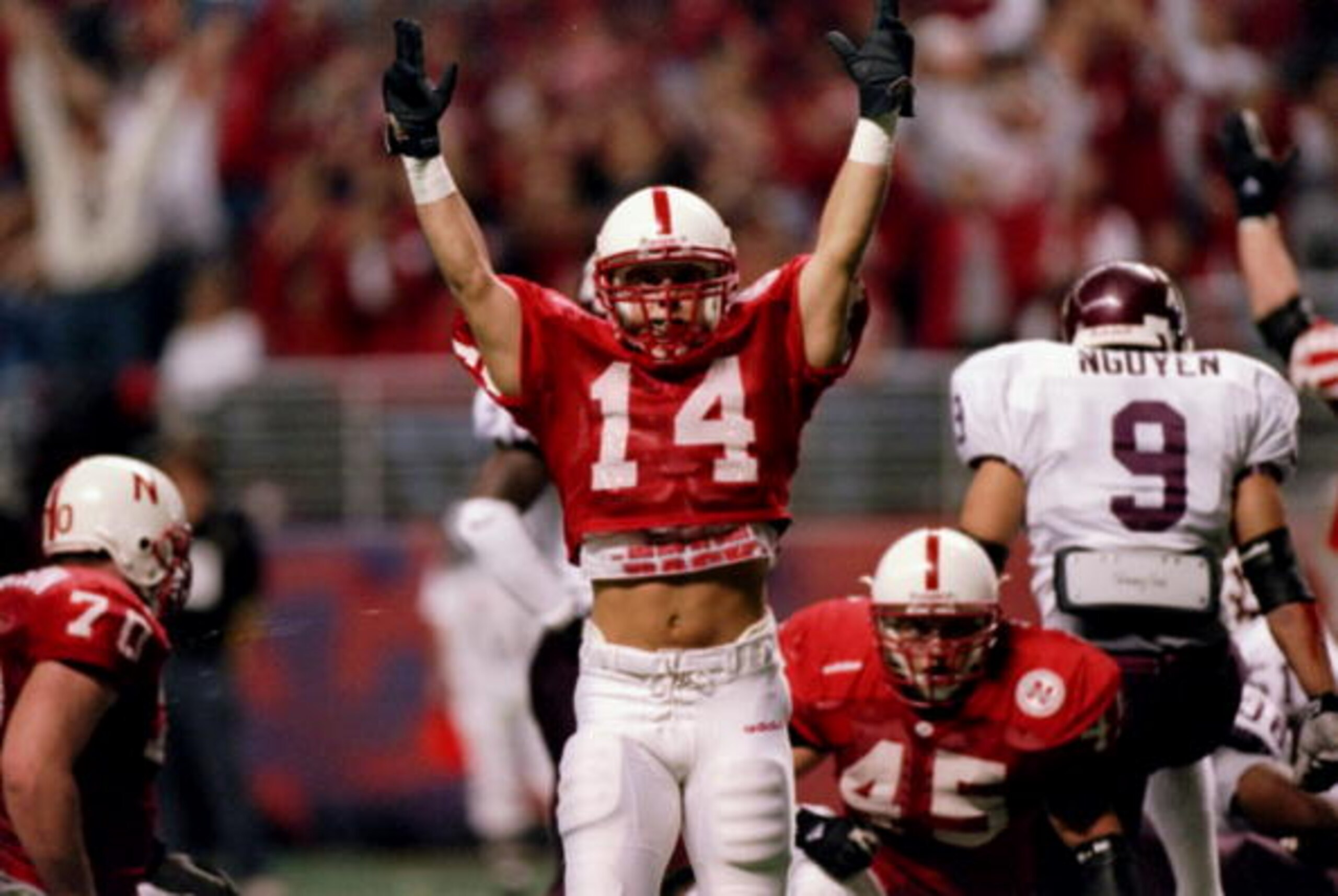 6 Dec 1997:  Running back Lance Brown of the Nebraska Cornhuskers celebrates during a game against the Texas A&M Aggies at the Alamodome in San Antonio, Texas.  Nebraska won the game 54-15. Mandatory Credit: Stephen Dunn  /Allsport