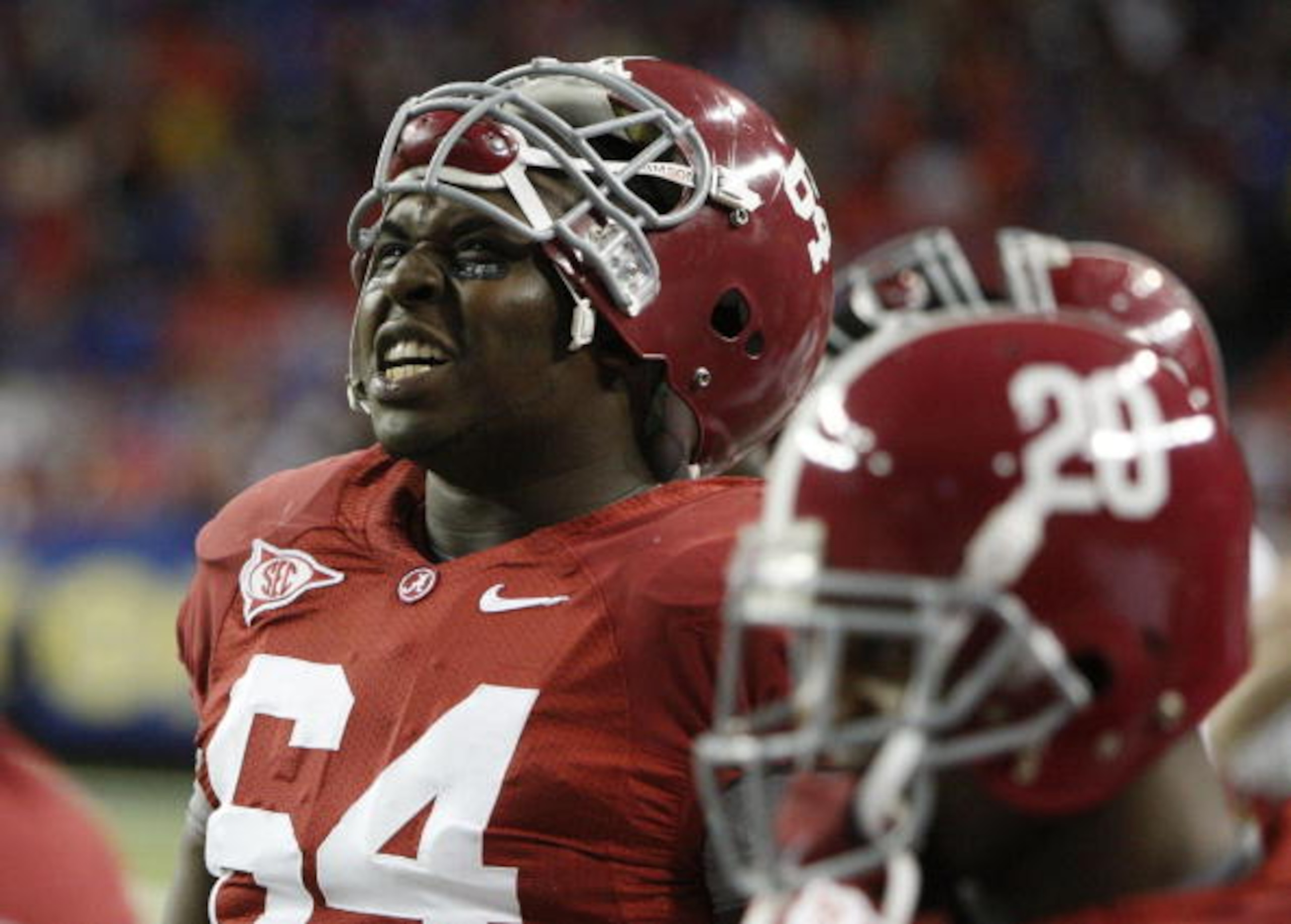ATLANTA - DECEMBER 5: Kerry Murphy #64 of the Alabama Crimson Tide celebrates their 32-13 win against the Florida Gators during the SEC Championship game at Georgia Dome on December 5, 2009 in Atlanta, Georgia. (Photo by Kevin C. Cox/Getty Images) ATLANTA - DECEMBER 5: Kerry Murphy #64 of the Alabama Crimson Tide celebrates their 32-13 win against the Florida Gators during the SEC Championship game at Georgia Dome on December 5, 2009 in Atlanta, Georgia. (Photo by Kevin C. Cox/Getty Images)