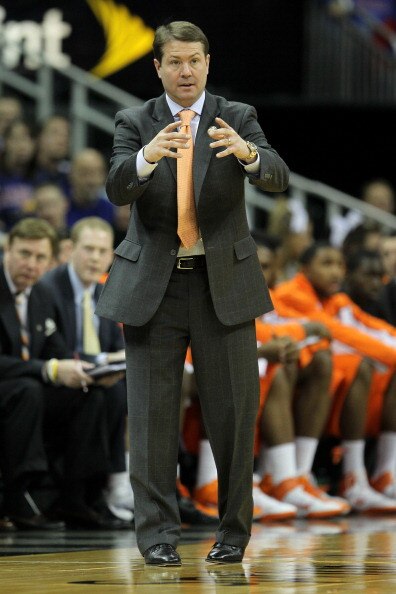 KANSAS CITY, MO - MARCH 10:  Head coach Travis Ford of the Oklahoma State Cowboys signals to his team against the Kansas Jayhawks during their quarterfinal game in the 2011 Phillips 66 Big 12 Men's Basketball Tournament at Sprint Center on March 10, 2011 
