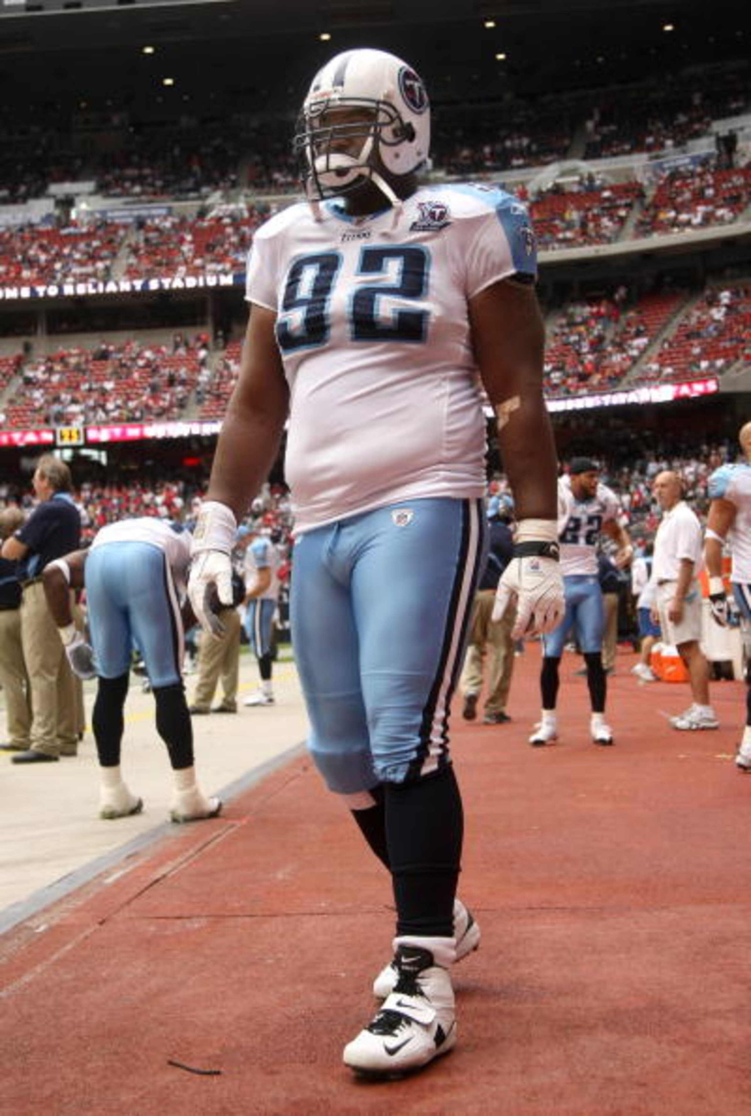 HOUSTON - DECEMBER 14: Defensive tackle Albert Haynesworth #92 of the Tennessee Titans paces by the bench before the game with the Houston Texans on December 14, 2008 at Reliant Stadium in Houston, Texas. The Texans won 13-12. (Photo by Stephen Dunn/Ge HOUSTON - DECEMBER 14: Defensive tackle Albert Haynesworth #92 of the Tennessee Titans paces by the bench before the game with the Houston Texans on December 14, 2008 at Reliant Stadium in Houston, Texas. The Texans won 13-12. (Photo by Stephen Dunn/Ge