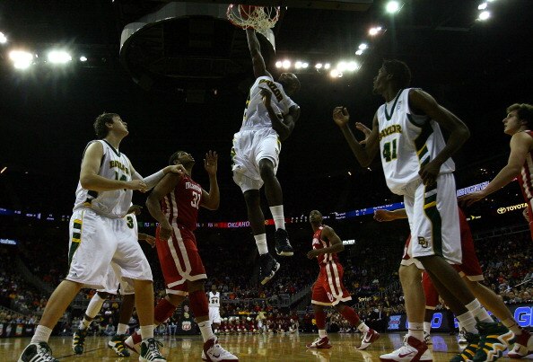 KANSAS CITY, MO - MARCH 09:  Quincy Acy #4 of the Baylor Bears dunks the ball against the Oklahoma Sooners during their game in the first round of the 2011 Phillips 66 Big 12 Men's Basketball Tournament at Sprint Center on March 9, 2011 in Kansas City, Mi