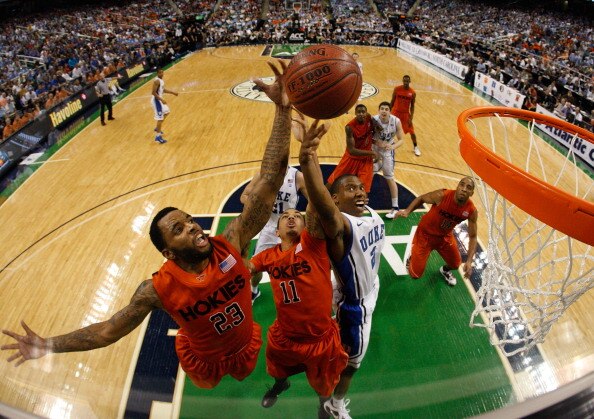 GREENSBORO, NC - MARCH 12:  Malcolm Delaney #23 and Erick Green #11 of the Virginia Tech Hokies battle for a loose ball against Nolan Smith #2 of the Duke Blue Devils in the semifinals of the 2011 ACC men's basketball tournament at the Greensboro Coliseum