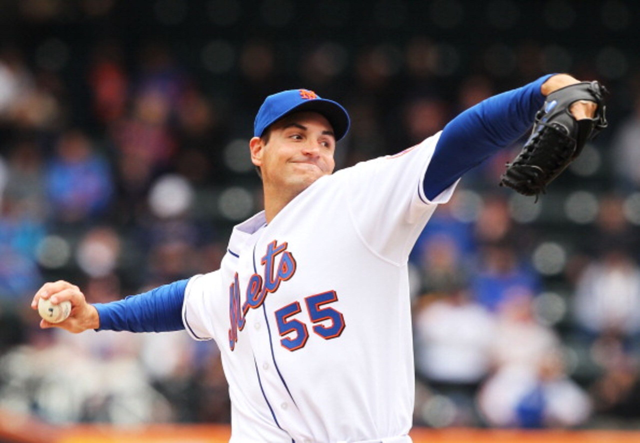 NEW YORK, NY - APRIL 10:  Chris Young #55 of the New York Mets pitches against the Washington Nationals during their game on April 10, 2011 at Citi Field in the Flushing neighborhood of the Queens borough of New York City.  (Photo by Al Bello/Getty Images