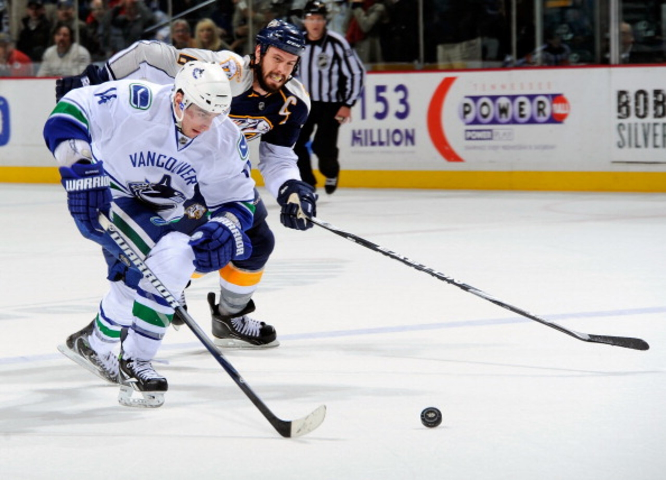 NASHVILLE, TN - MARCH 29: Alexandre Burrows #14 of the Vancouver Canucks outskates Shea Weber #6 of the Nashville Predators to score a goal on the breakaway on March 29, 2011 at the Bridgestone Arena in Nashville, Tennessee. (Photo by Frederick Breedon/ NASHVILLE, TN - MARCH 29: Alexandre Burrows #14 of the Vancouver Canucks outskates Shea Weber #6 of the Nashville Predators to score a goal on the breakaway on March 29, 2011 at the Bridgestone Arena in Nashville, Tennessee. (Photo by Frederick Breedon/