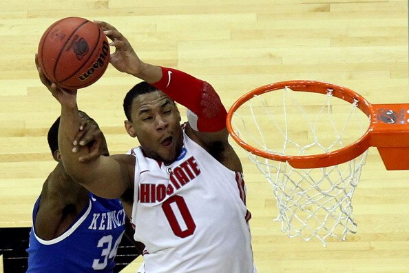 NEWARK, NJ - MARCH 25:  Jared Sullinger #0 of the Ohio State Buckeyes goes for a lay up against DeAndre Liggins #34 of the Kentucky Wildcats during the second half of the east regional semifinal of the 2011 NCAA Men's Basketball Tournament at the Prudenti
