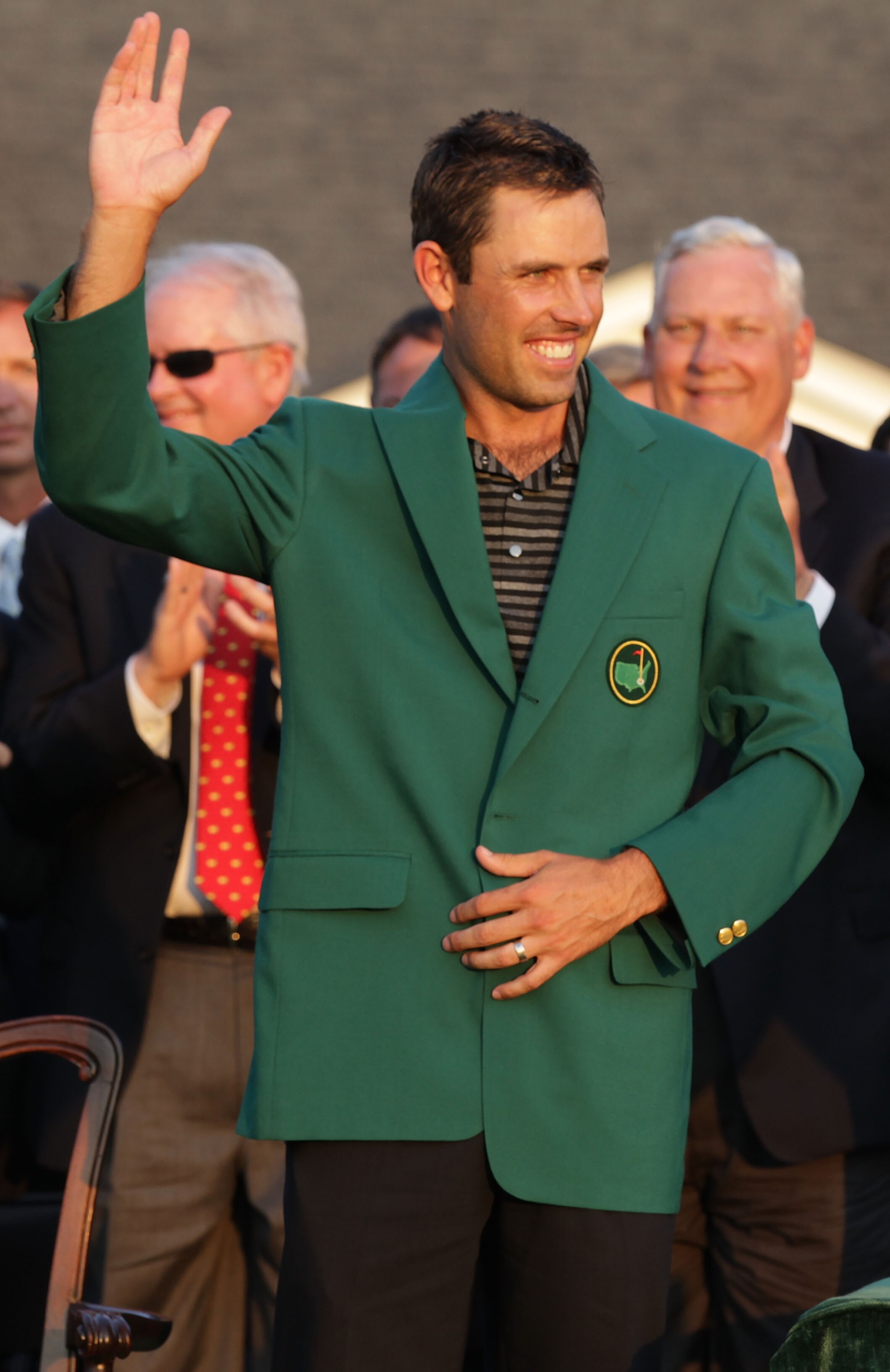 AUGUSTA, GA - APRIL 10:  Charl Schwartzel of South Africa waves to the gallery at the green jacket presentation after his two-stroke victory at the 2011 Masters Tournament at Augusta National Golf Club on April 10, 2011 in Augusta, Georgia.  (Photo by Dav