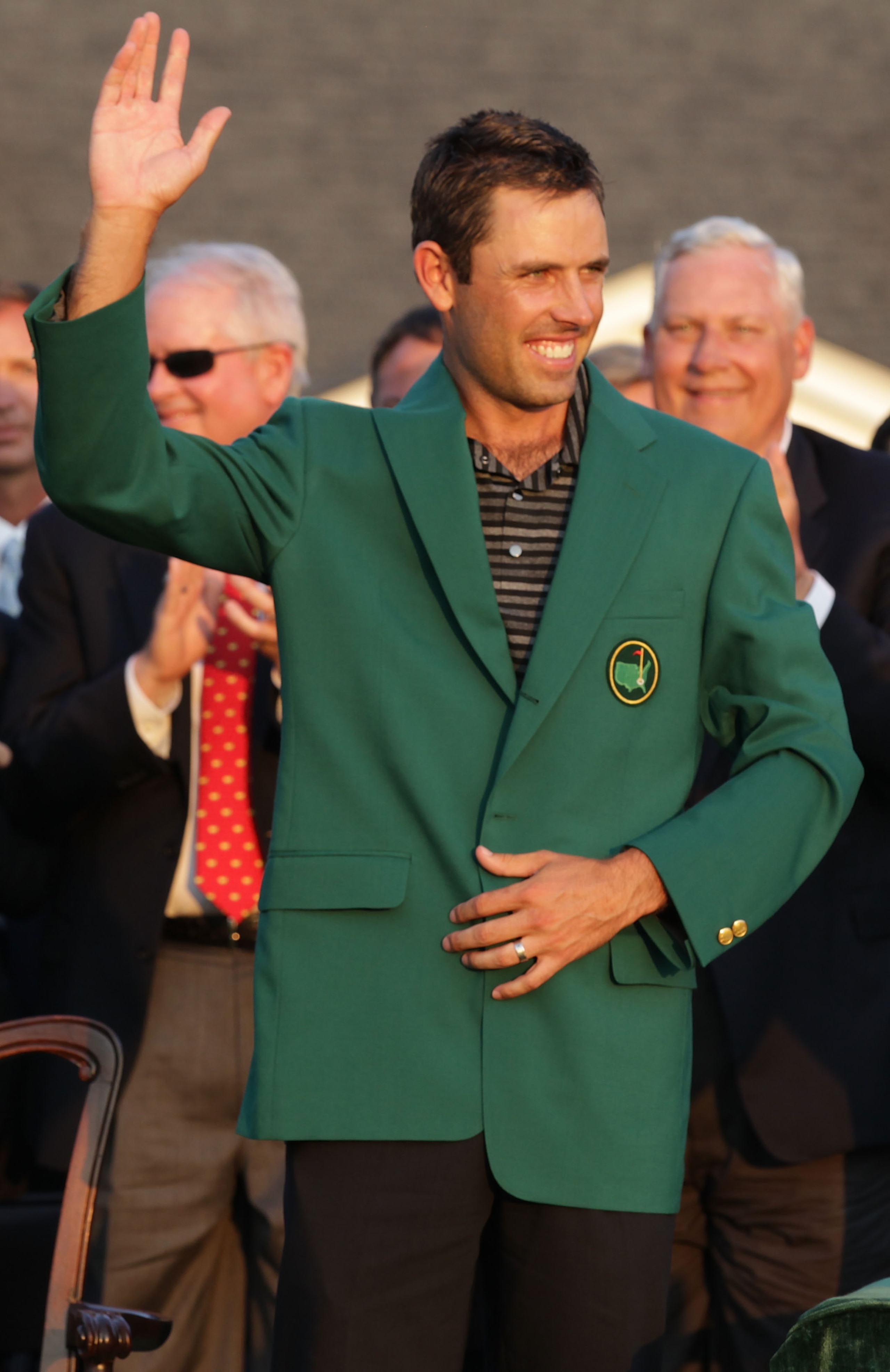 AUGUSTA, GA - APRIL 10:  Charl Schwartzel of South Africa waves to the gallery at the green jacket presentation after his two-stroke victory at the 2011 Masters Tournament at Augusta National Golf Club on April 10, 2011 in Augusta, Georgia.  (Photo by Dav