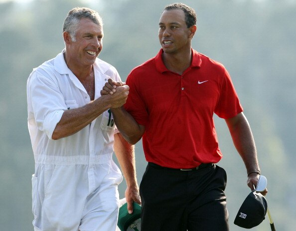 AUGUSTA, GA - APRIL 10:  Tiger Woods walks off the 18th green with his caddie Steve Williams during the final round of the 2011 Masters Tournament at Augusta National Golf Club on April 10, 2011 in Augusta, Georgia.  (Photo by Andrew Redington/Getty Image