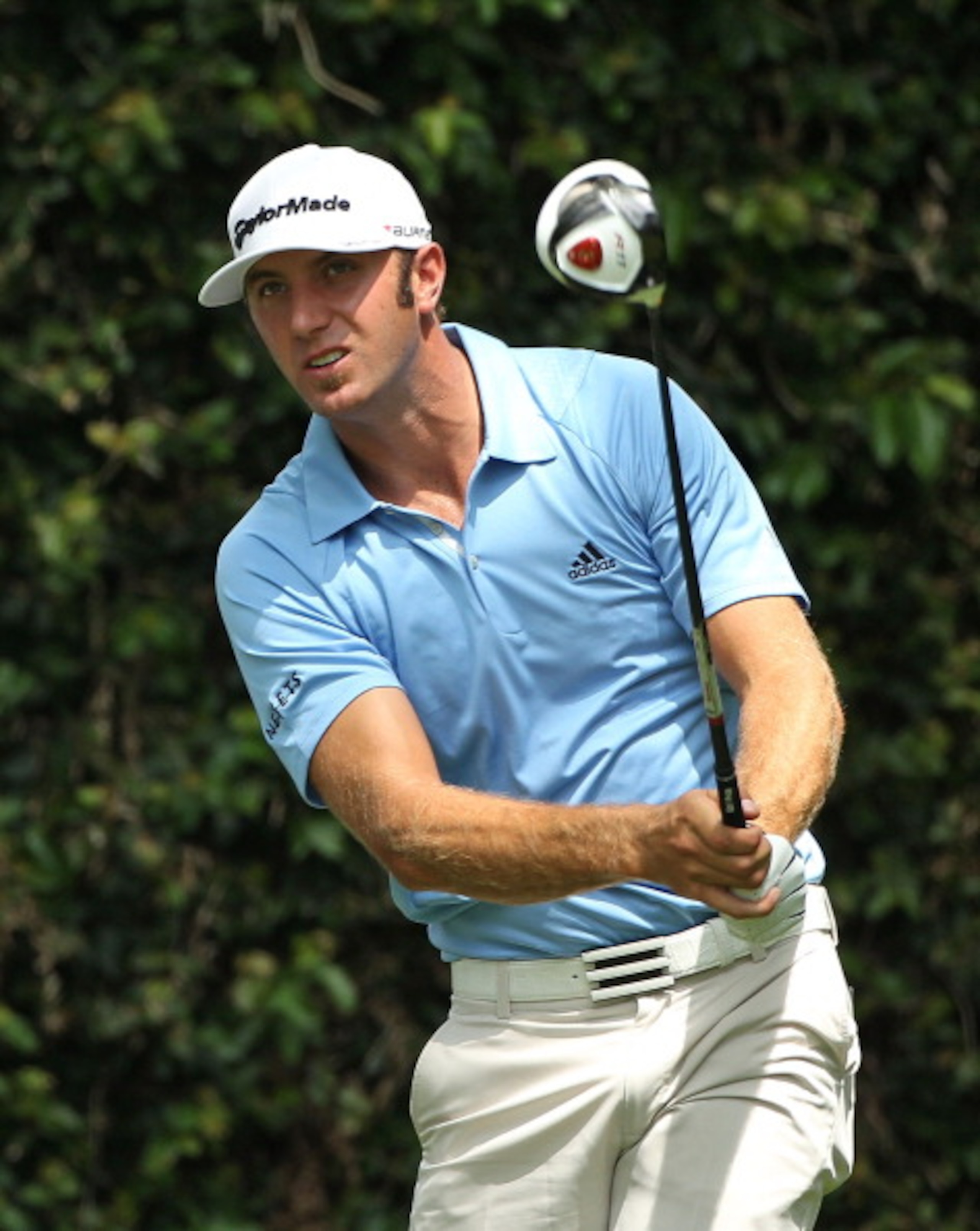 AUGUSTA, GA - APRIL 09:  Dustin Johnson watches his tee shot on the second hole during the third round of the 2011 Masters Tournament at Augusta National Golf Club on April 9, 2011 in Augusta, Georgia.  (Photo by Andrew Redington/Getty Images)