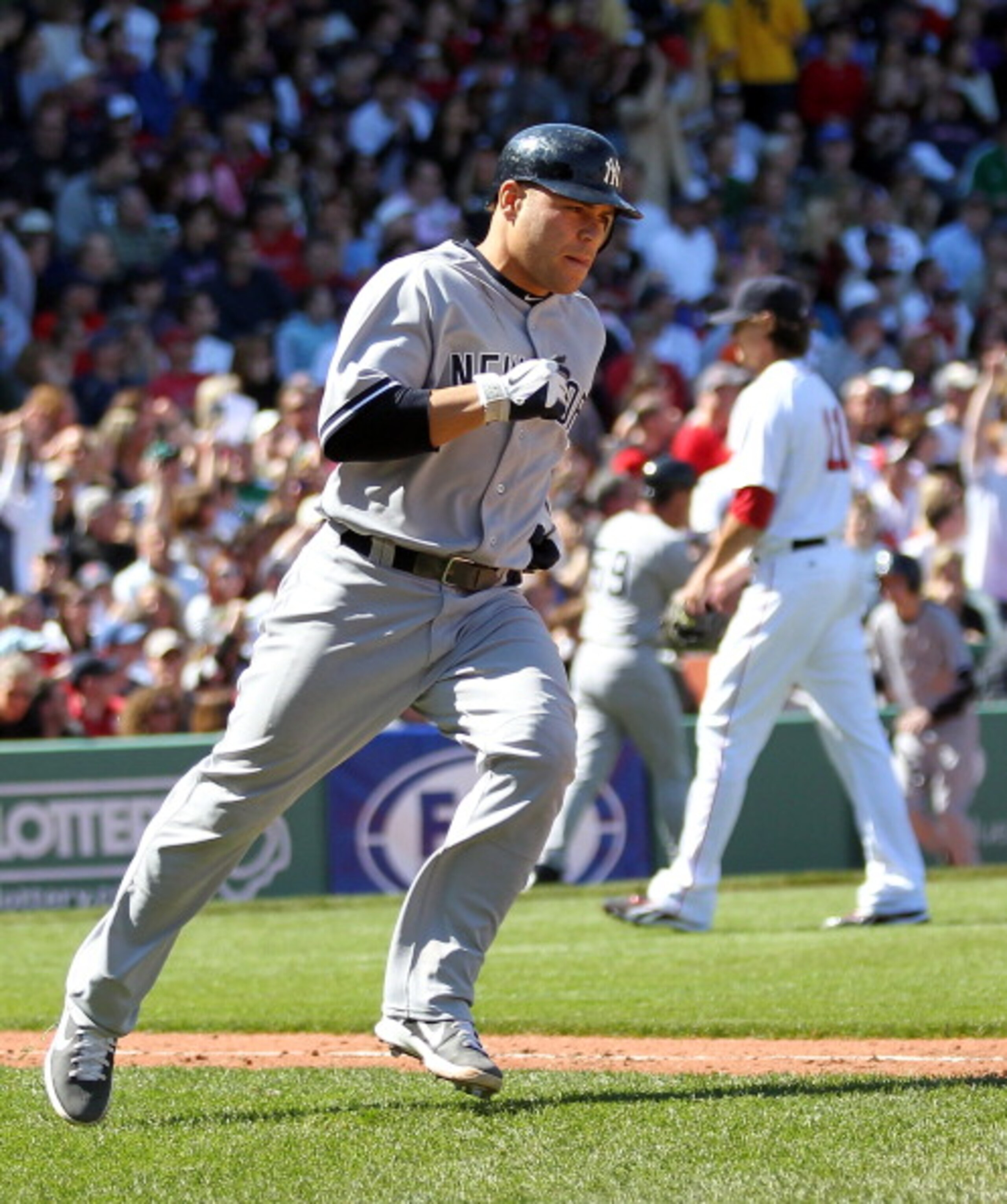 BOSTON, MA - APRIL 9: Russell Martin #55 of the New York Yankees rounds the bases after he connected for a three-run home run against the Boston Red Sox in the first inning at Fenway Park April 9, 2011 in Boston, Massachusetts. (Photo by Jim Rogash/Getty BOSTON, MA - APRIL 9: Russell Martin #55 of the New York Yankees rounds the bases after he connected for a three-run home run against the Boston Red Sox in the first inning at Fenway Park April 9, 2011 in Boston, Massachusetts. (Photo by Jim Rogash/Getty