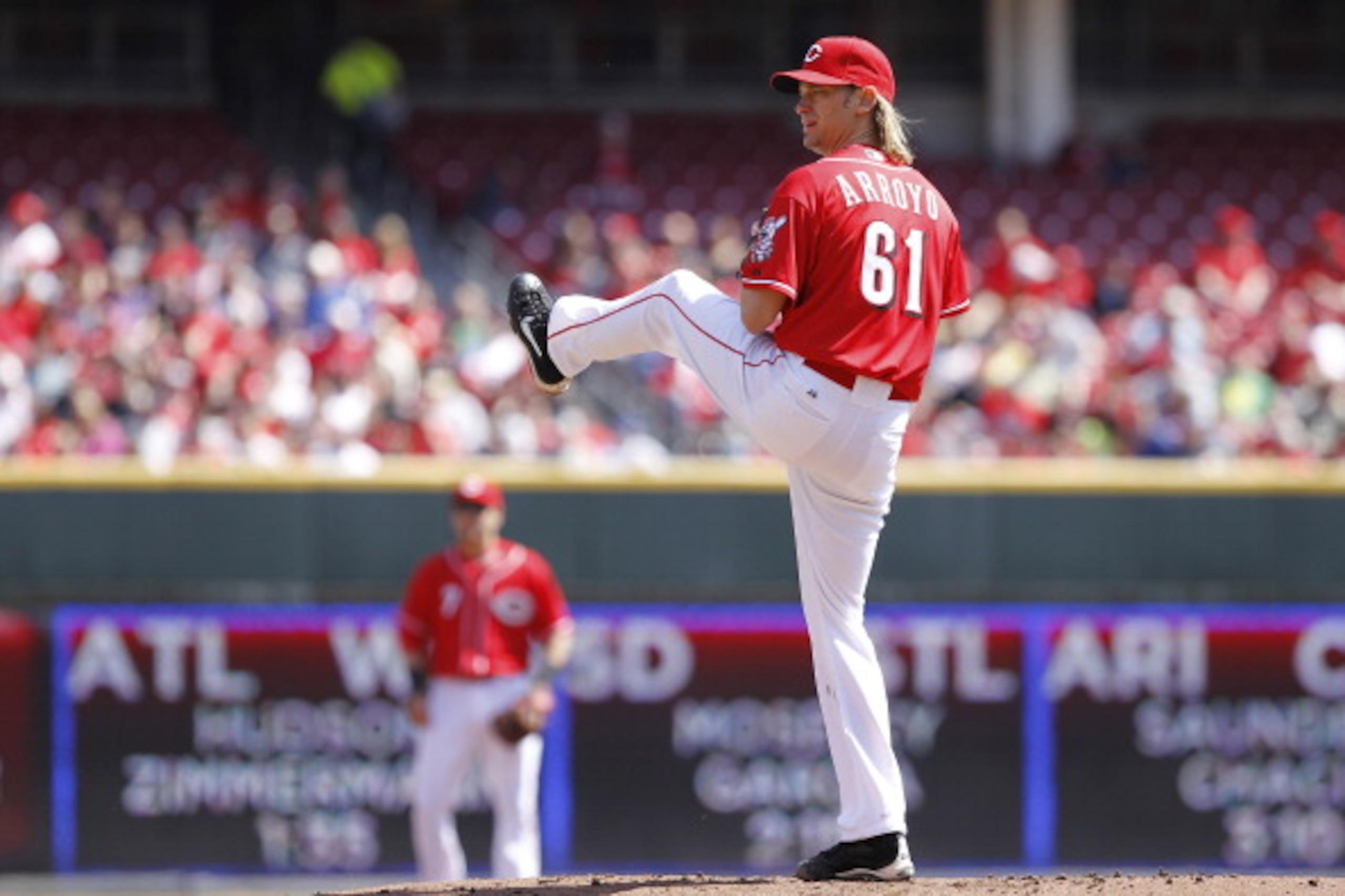 CINCINNATI, OH - APRIL 3: Bronson Arroyo #61 of the Cincinnati Reds pitches against the Milwaukee Brewers at Great American Ball Park on April 3, 2011 in Cincinnati, Ohio. The Reds won 12-3. (Photo by Joe Robbins/Getty Images)