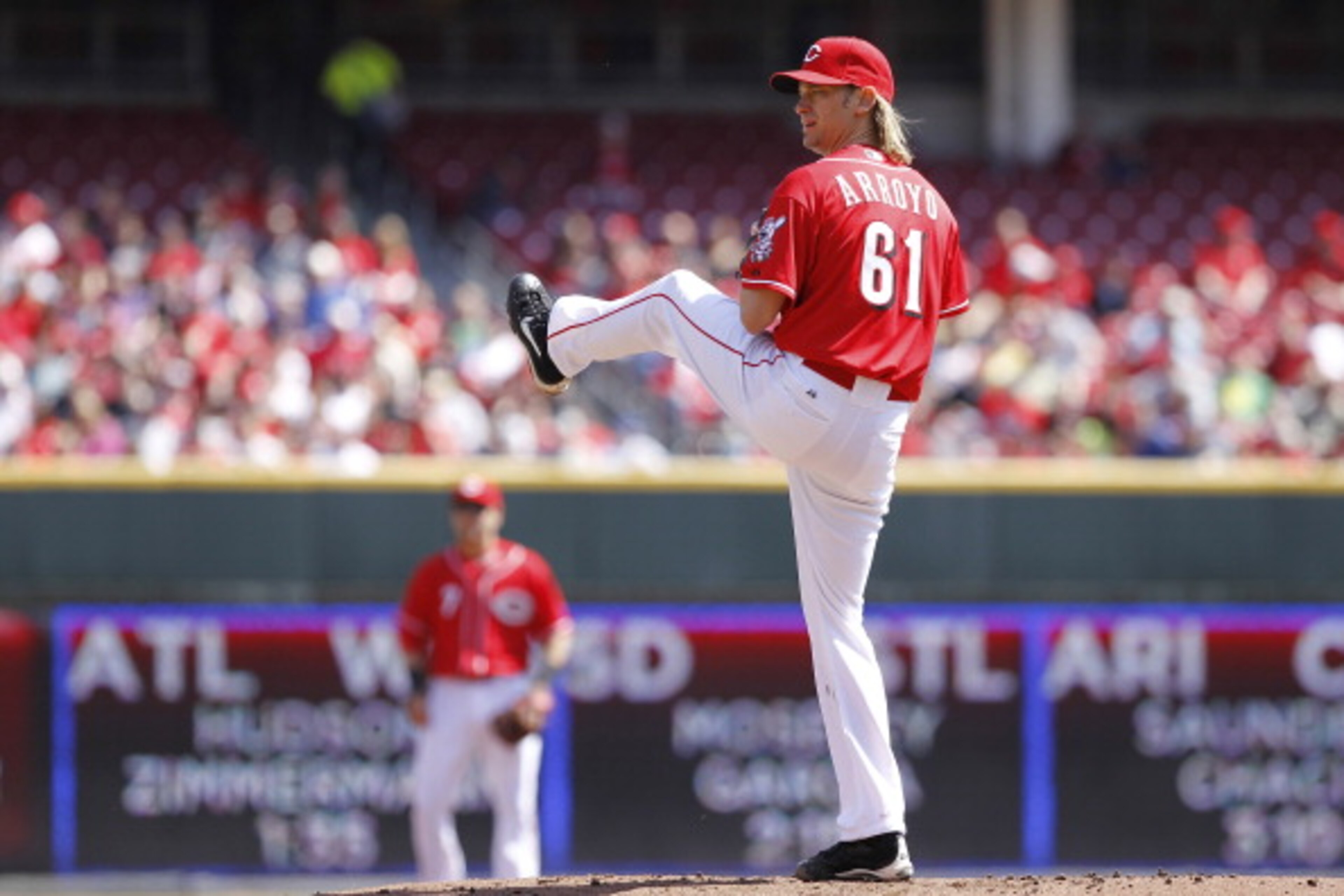 CINCINNATI, OH - APRIL 3: Bronson Arroyo #61 of the Cincinnati Reds pitches against the Milwaukee Brewers at Great American Ball Park on April 3, 2011 in Cincinnati, Ohio. The Reds won 12-3. (Photo by Joe Robbins/Getty Images)