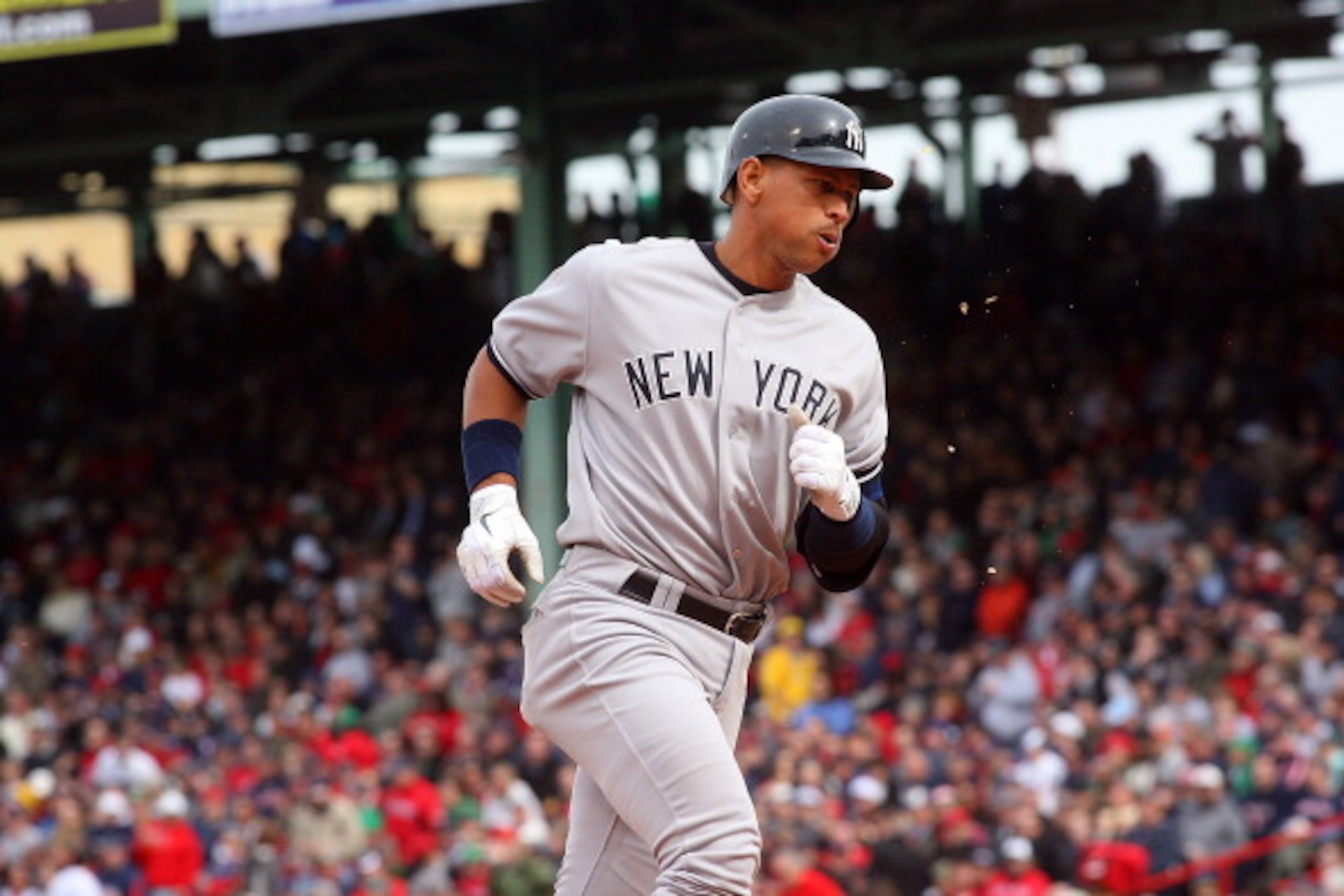 BOSTON, MA - APRIL 8:  Alex Rodriguez #13 of the New York Yankees rounds the bases after hitting a home run in the fifth inning against the Boston Red Sox during opening game at Fenway Park, April 8, 2011 in Boston, Massachusetts. (Photo by Gail Oskin/Get